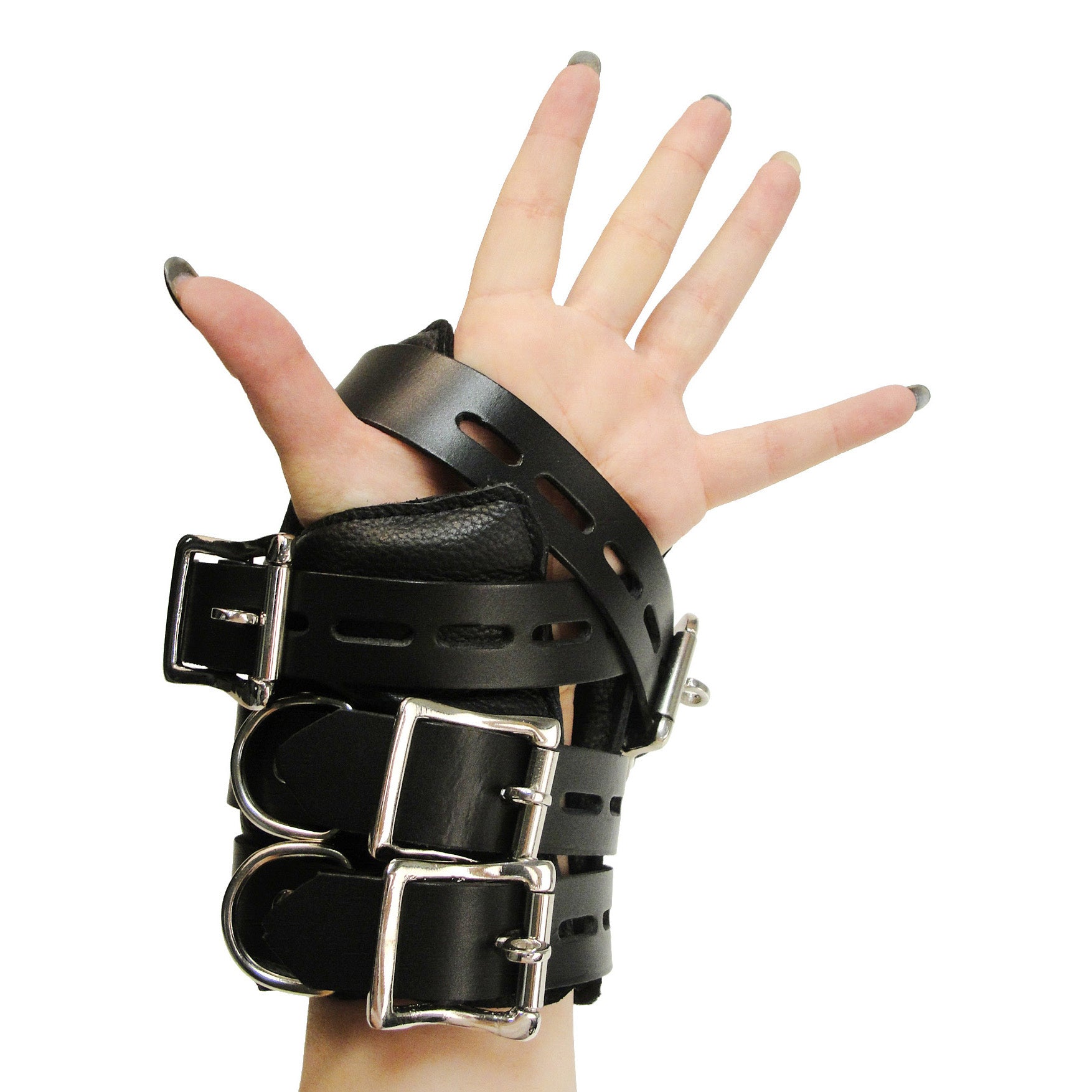 Close-up of a hand wearing Strict Leather Four Buckle Suspension Cuffs