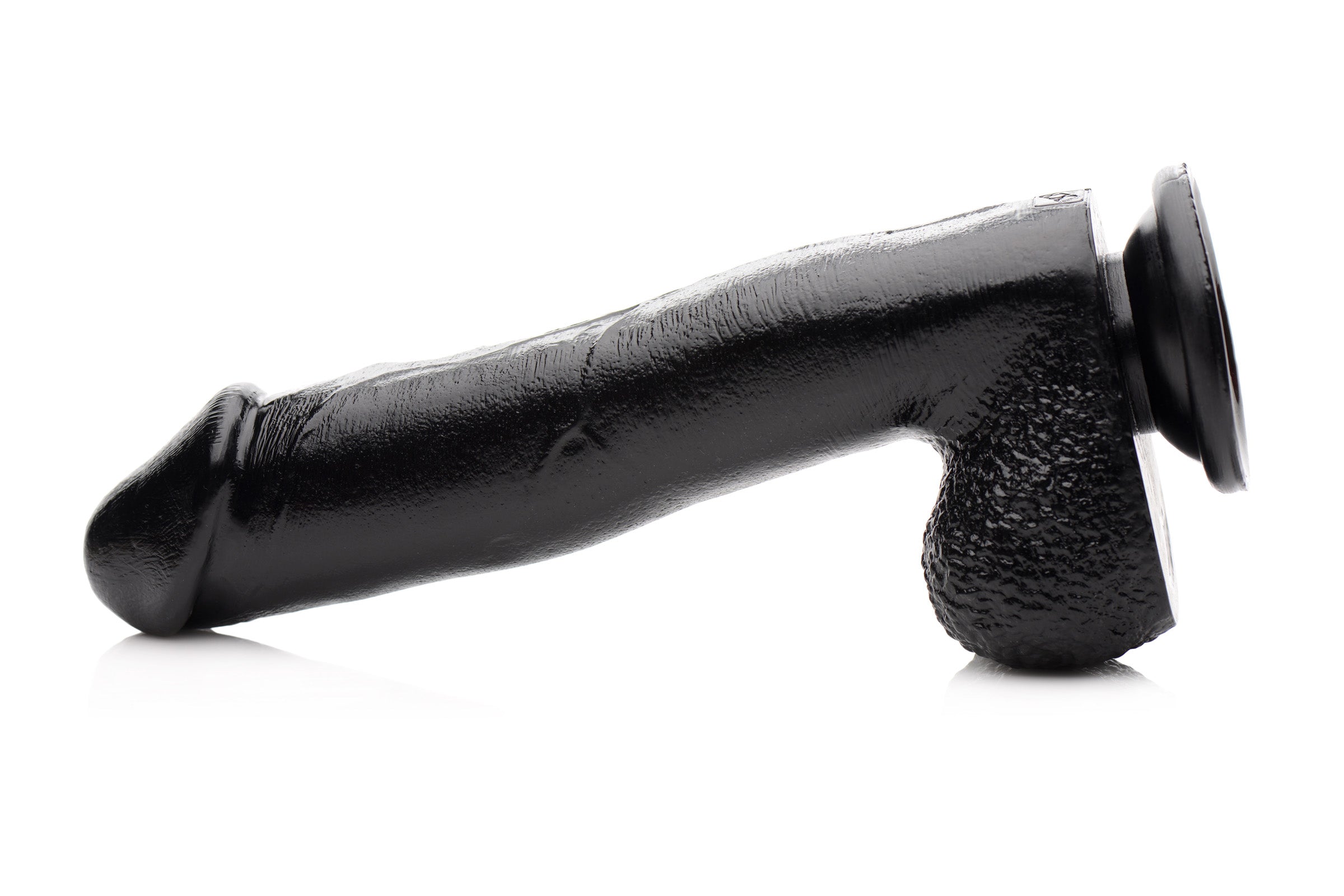 Close-up of the Mighty Midnight 10 inch dildo with ergonomic grip