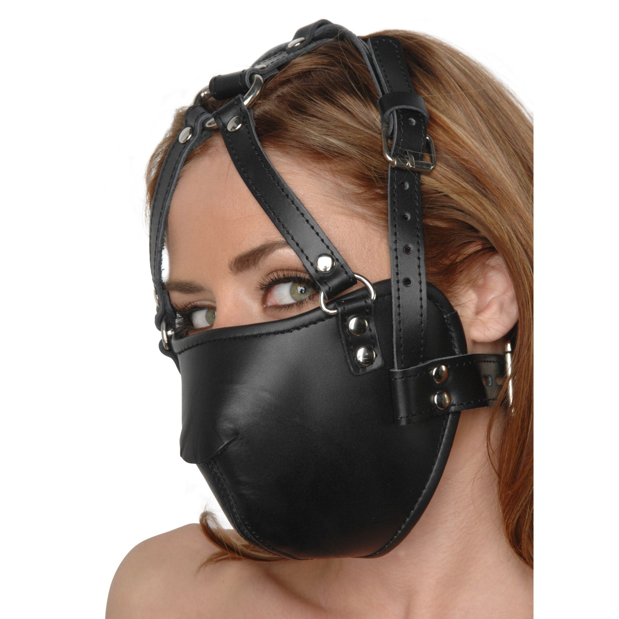 Close-up view of the Strict Leather Face Harness worn by a model