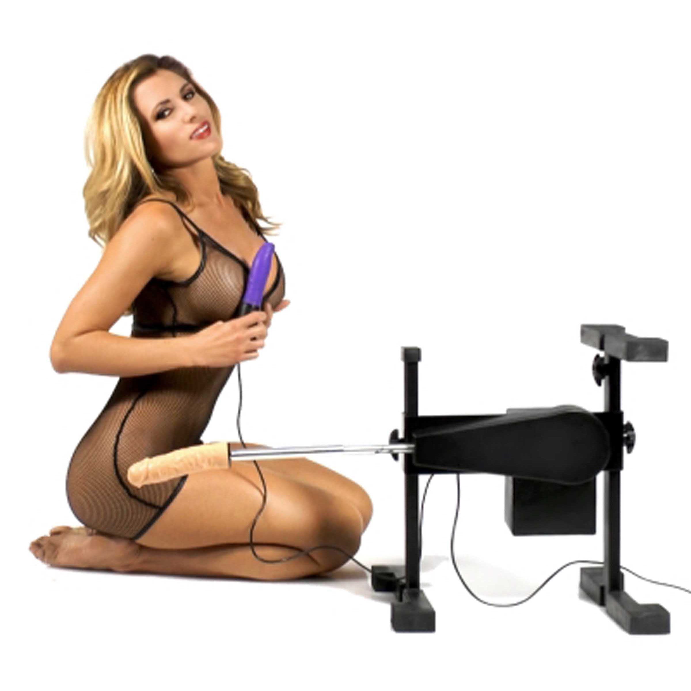 Versa Fuk Machine demonstrated by a model in a black dress