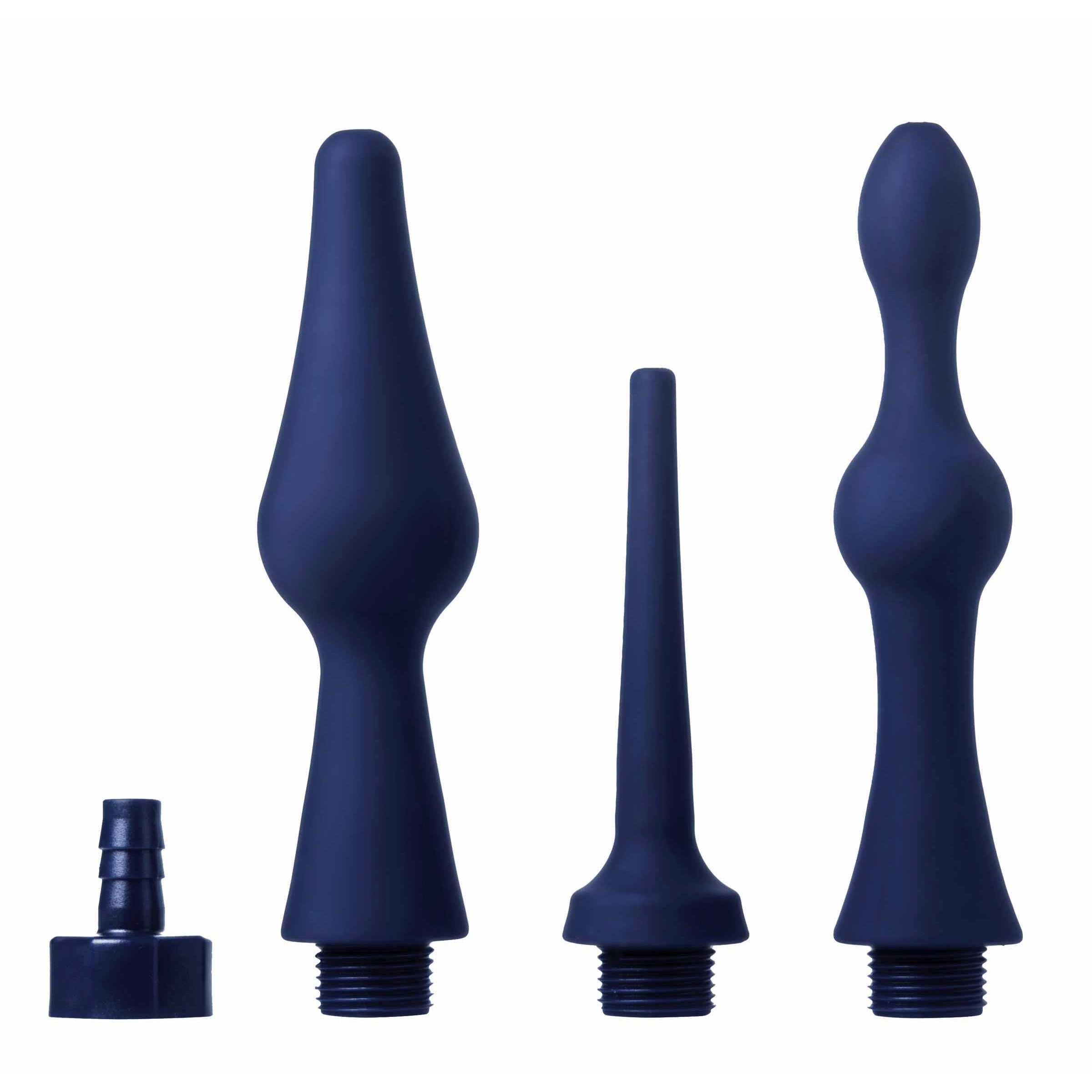 Set of three silicone enema attachments in various shapes on a neutral background