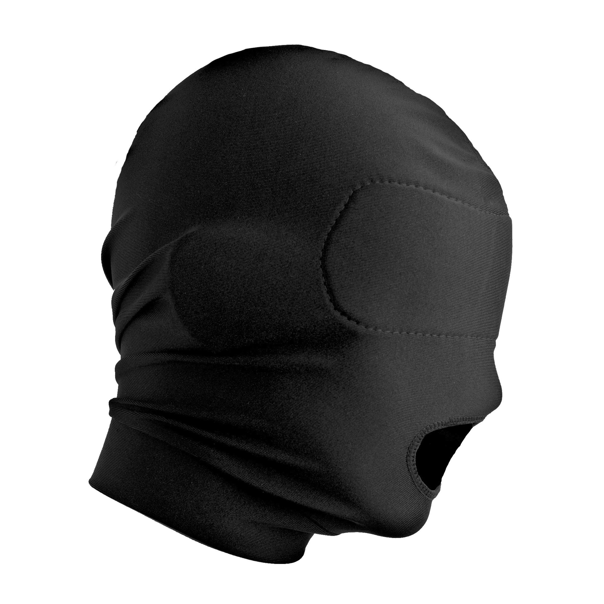 Black disguise hood with open mouth and blindfold laid out on a white surface