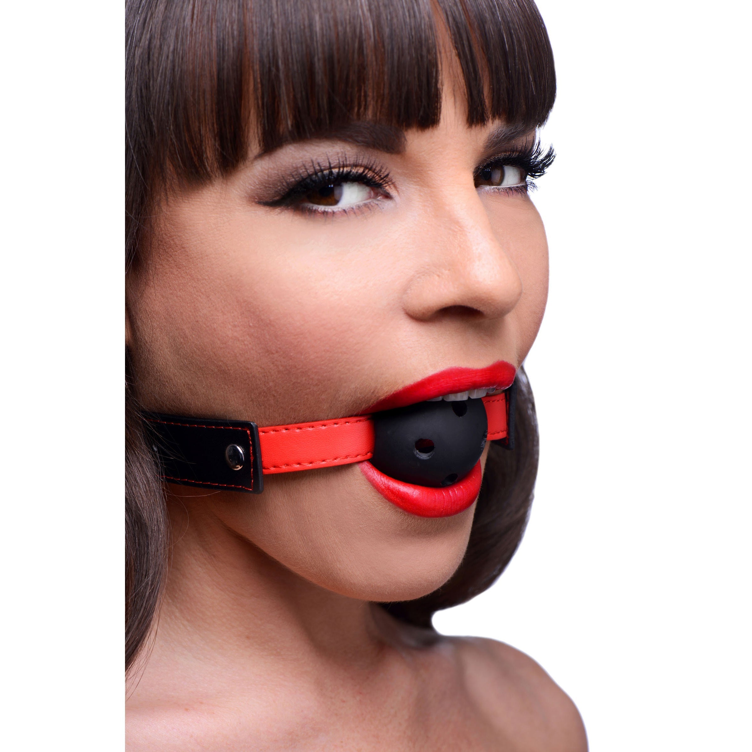 A model wearing the Subdue Me Breathable Ball Gag with a black strap