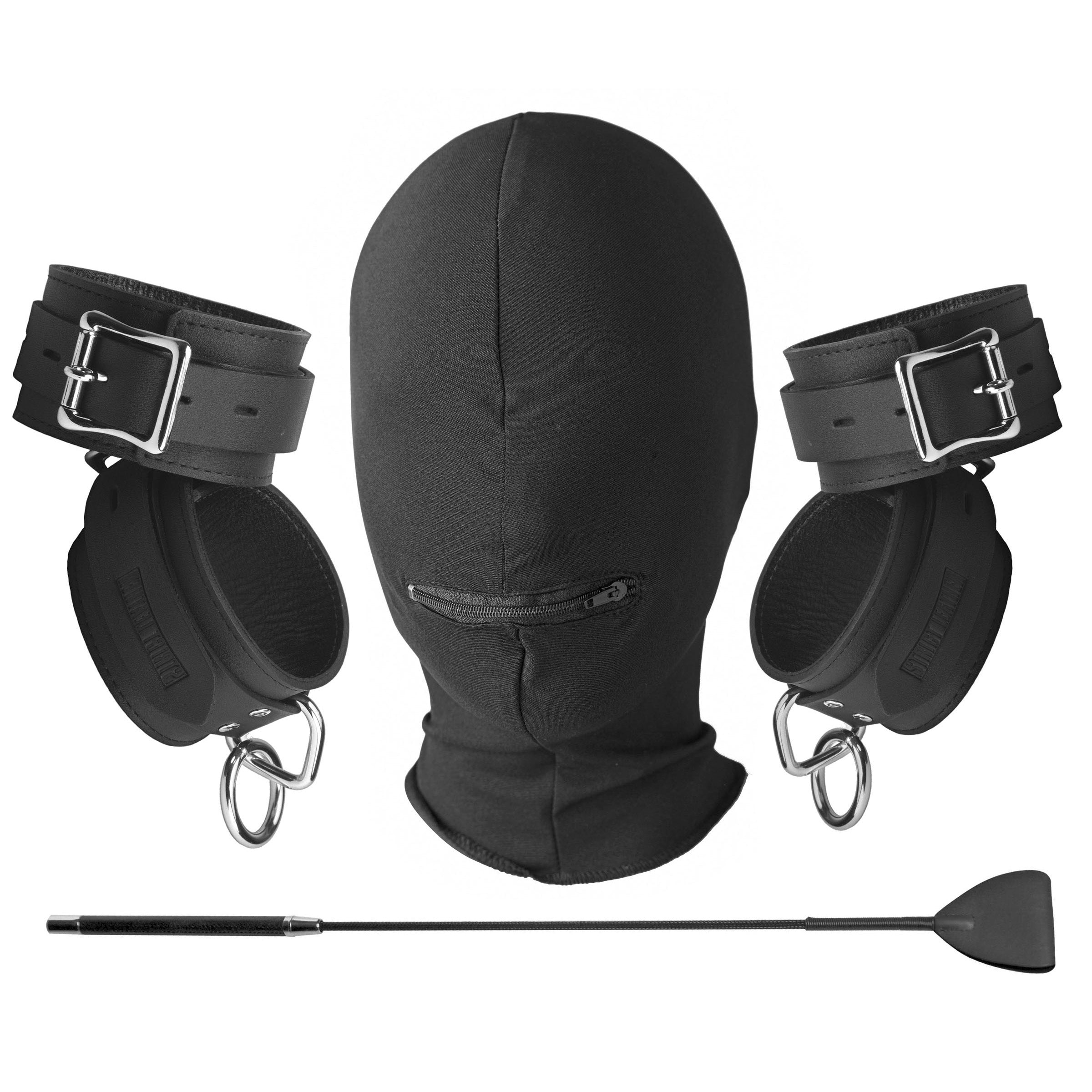 Close-up of the Intro To Femdom Bondage Kit accessories including wrist restraints and a paddle