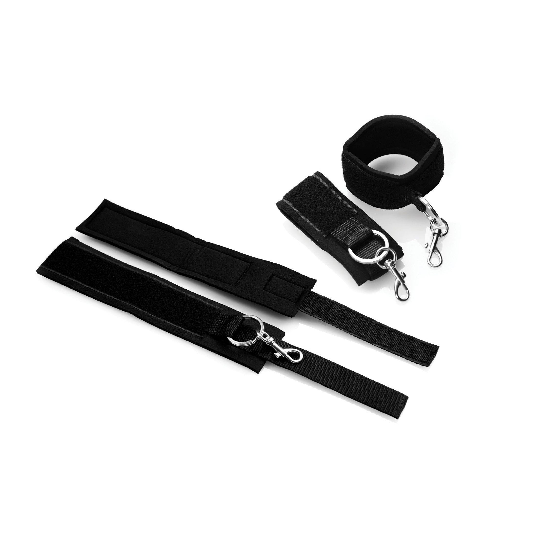 Black leather over-the-door restraint straps with metal hardware