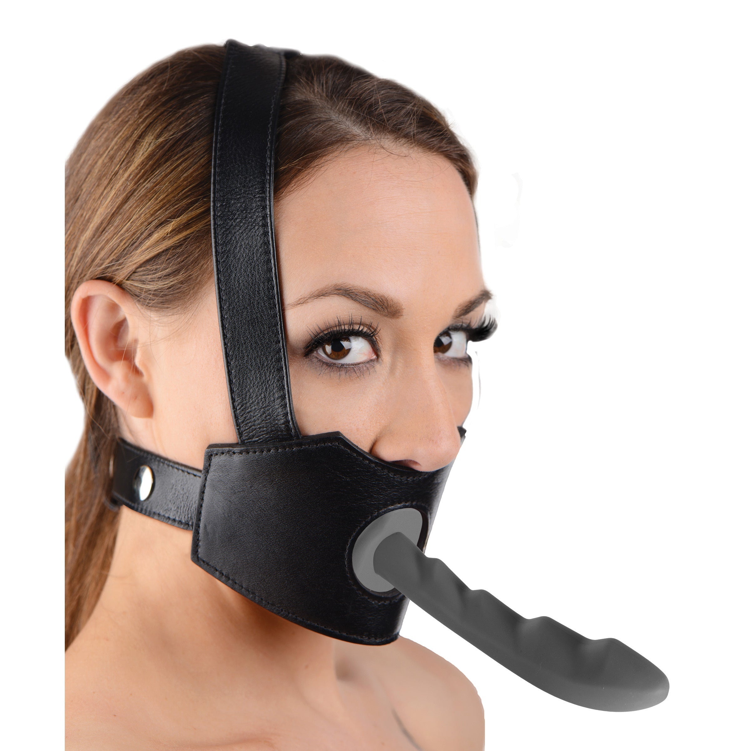 Model demonstrating the use of the Face Fuk II Dildo Face Harness with attached gag and leash