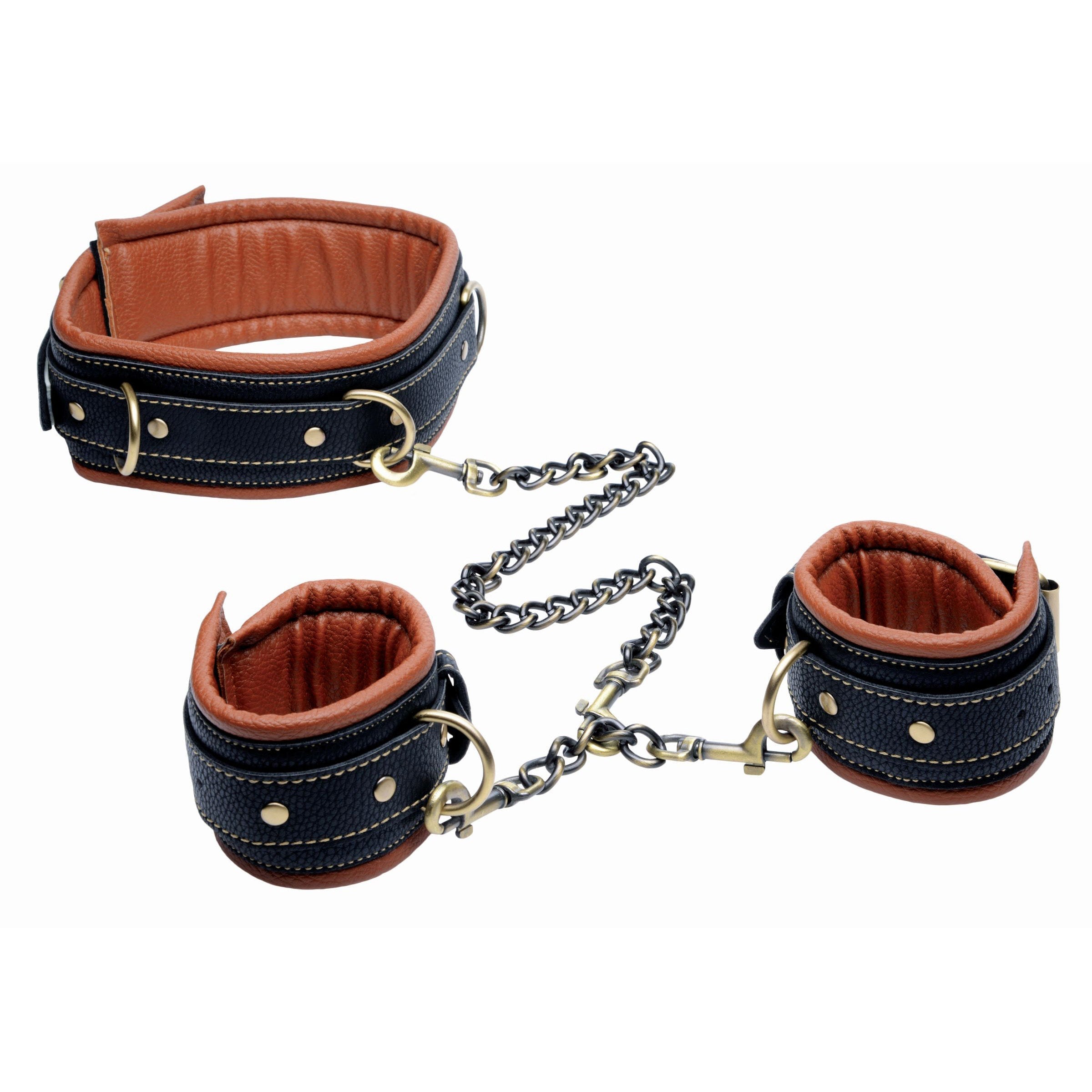 Close-up of leather wrist cuffs with chain attachments