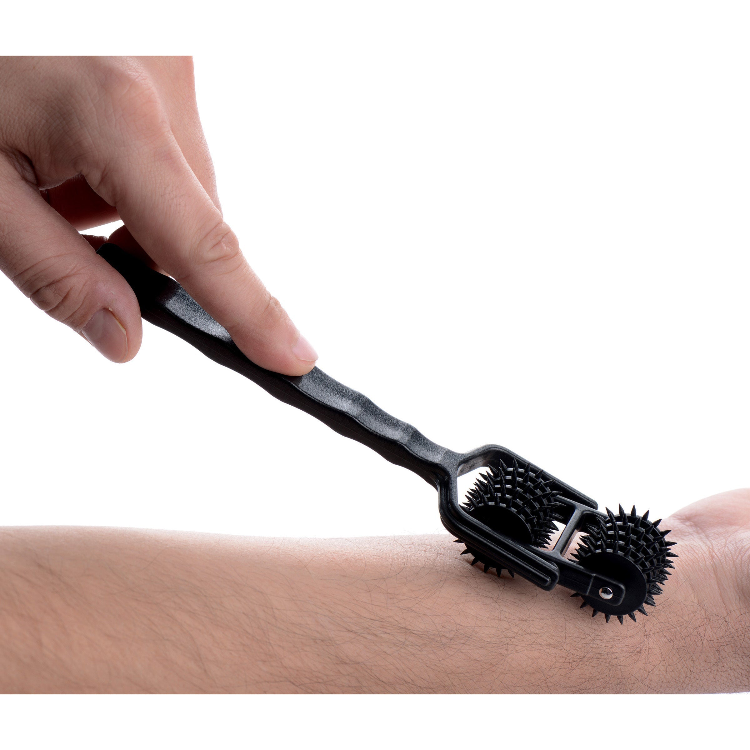 Demonstrating the use of the Transfix Dual Pinwheel on skin for sensation enhancement