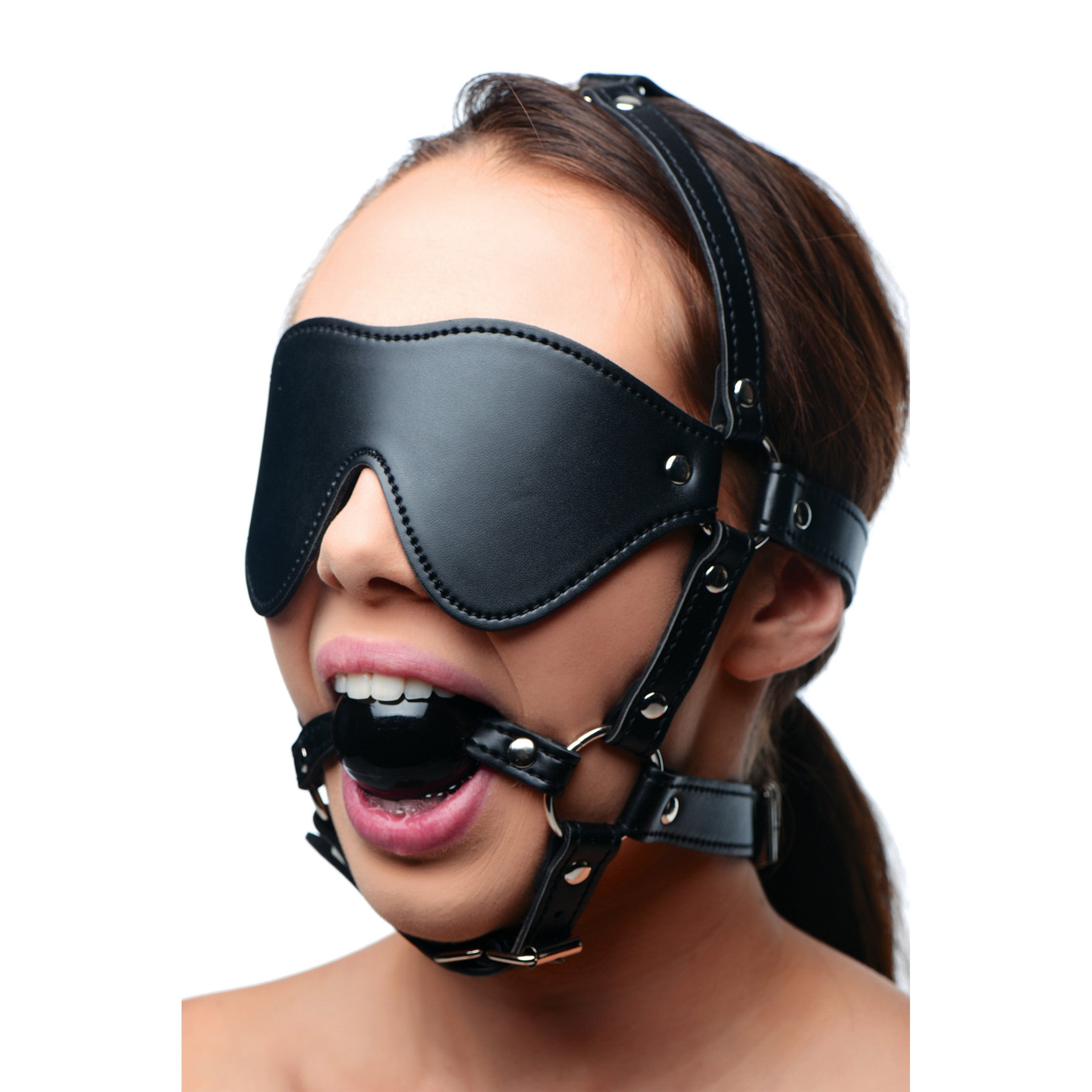 Close-up of a black ball gag with adjustable strap