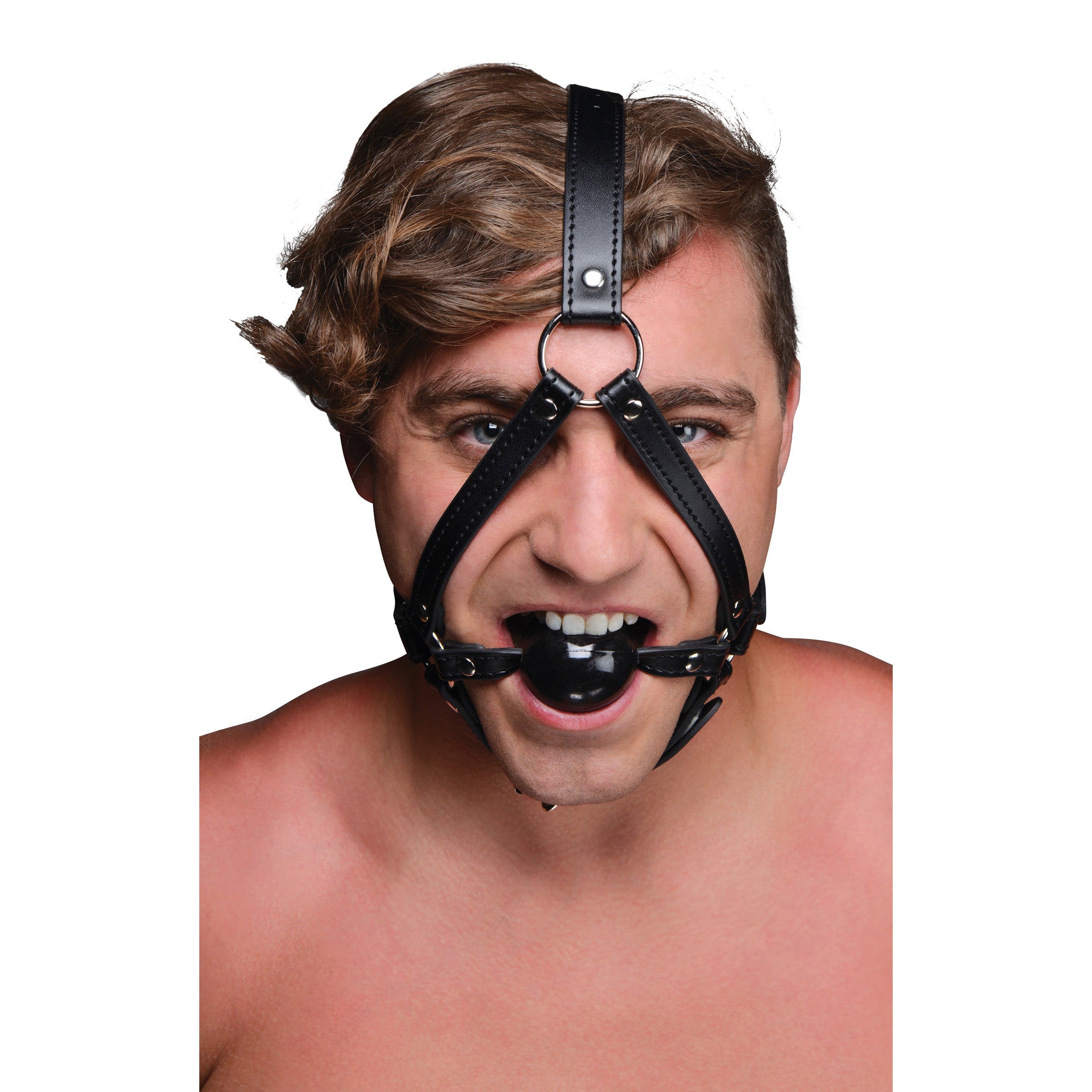 Person modeling a head harness with an incorporated inch-sized ball gag