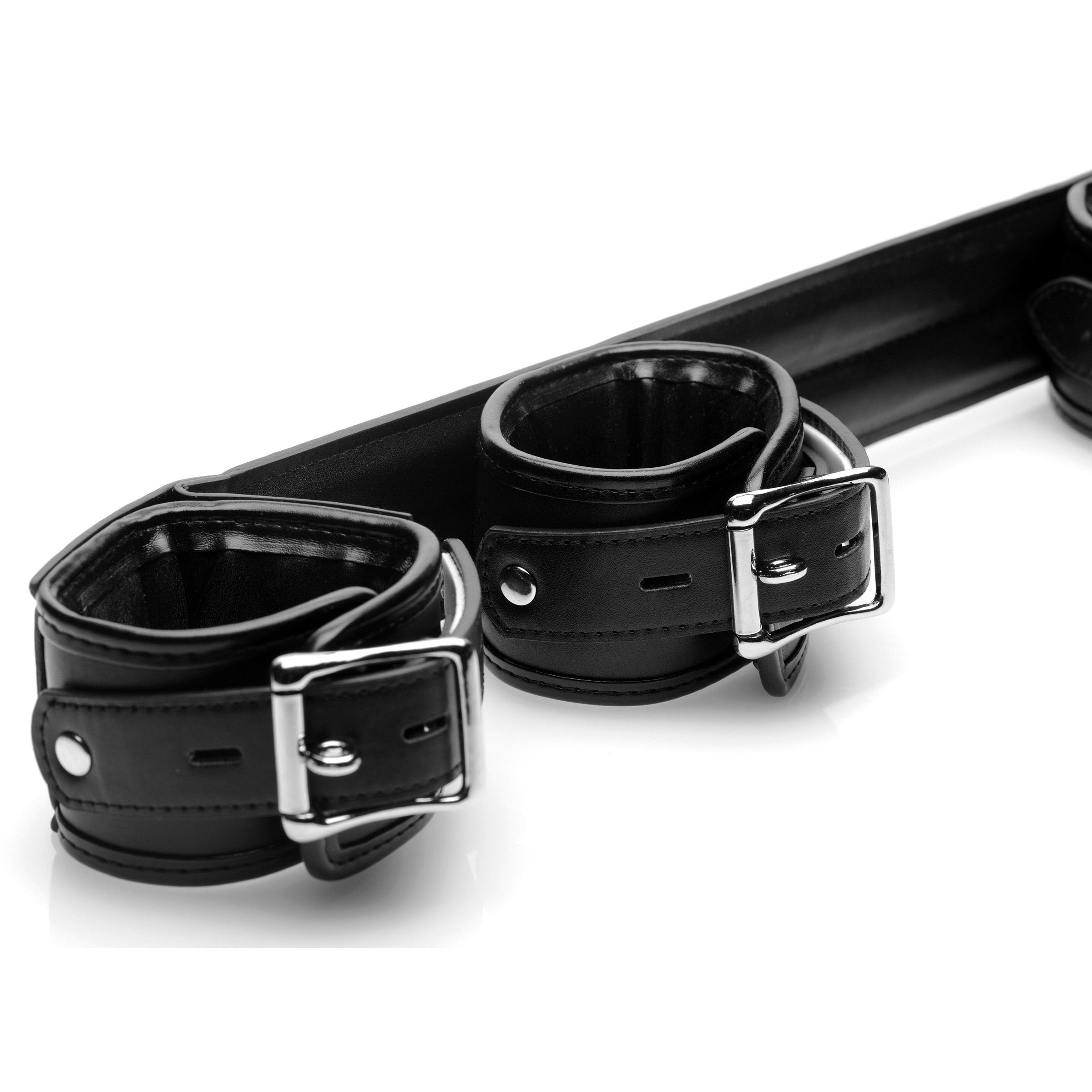 Close-up of the leather cuffs with dual buckles from the Deluxe Rigid Spreader Bar set