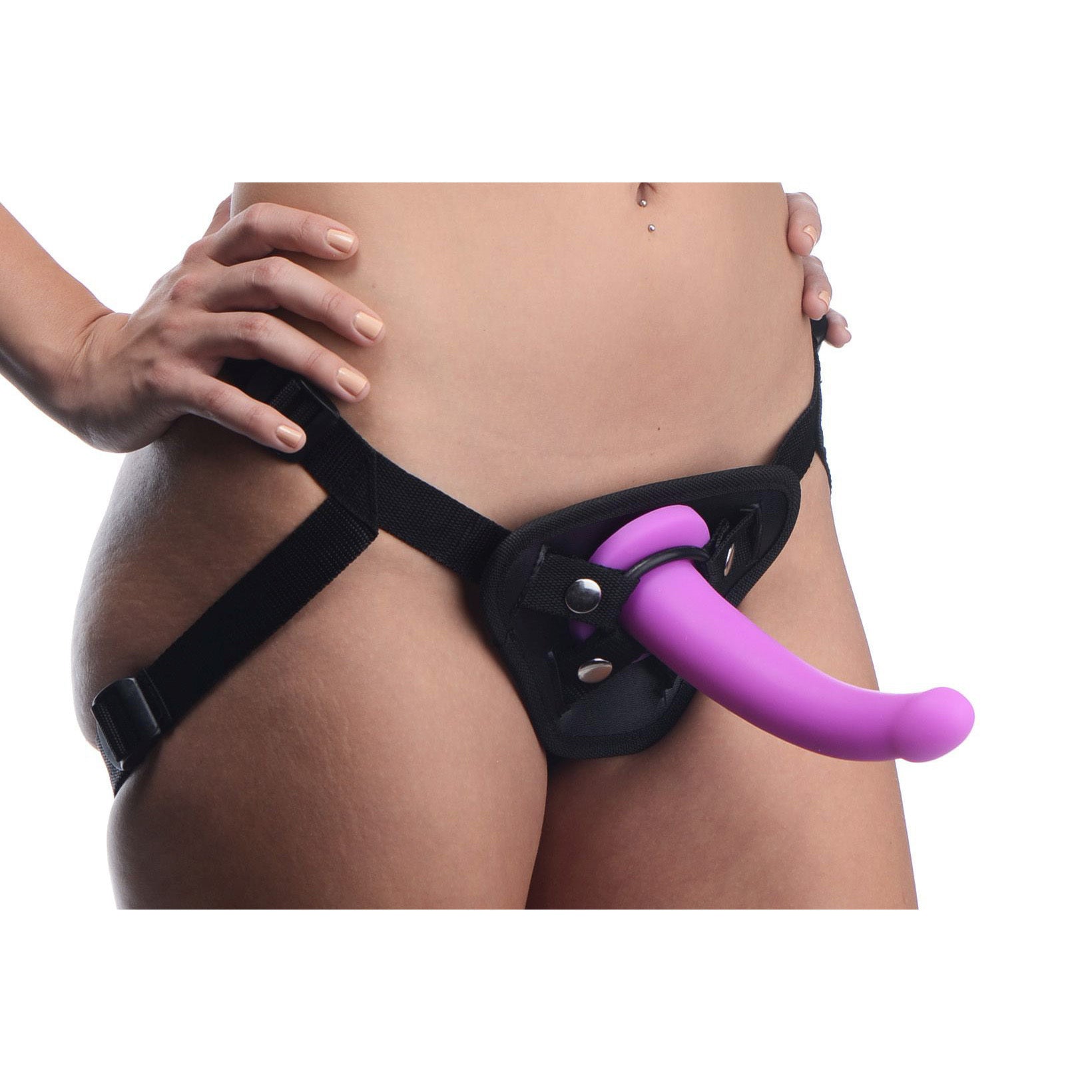 Close-up of a silicone G-spot dildo with harness in purple