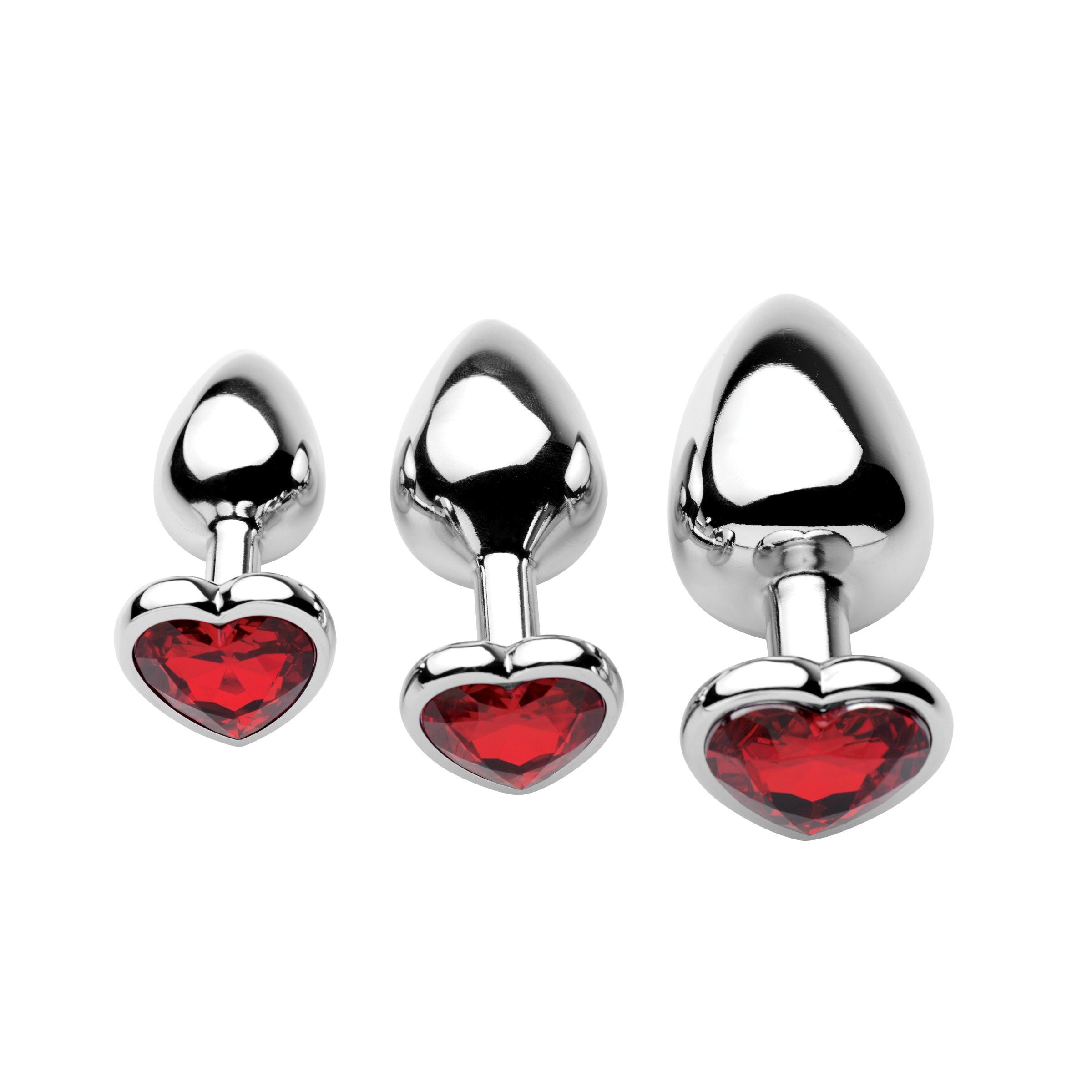 Trio of Chrome Hearts jeweled anal plugs with heart shapes