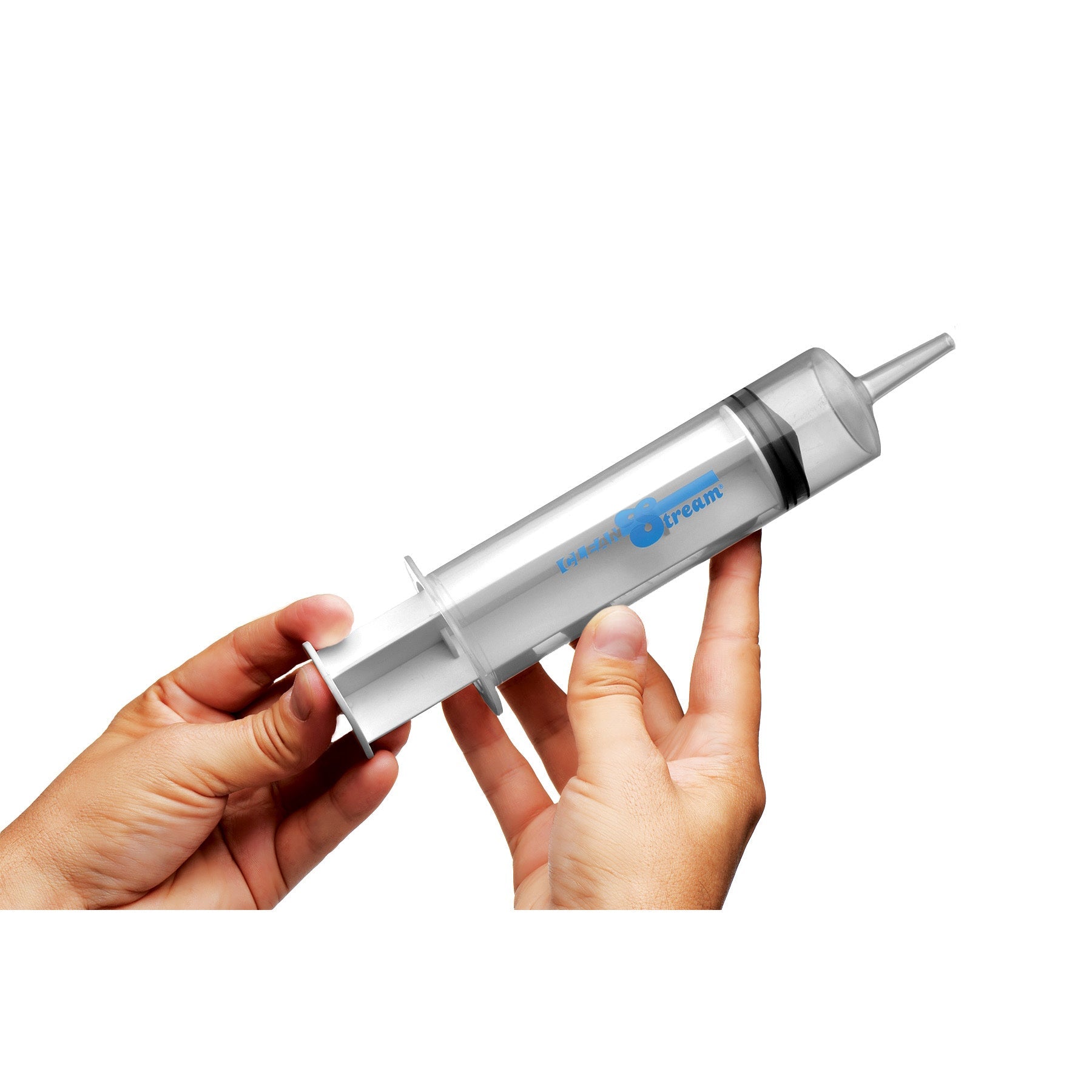 A hand gripping a 150ml enema syringe with a transparent barrel