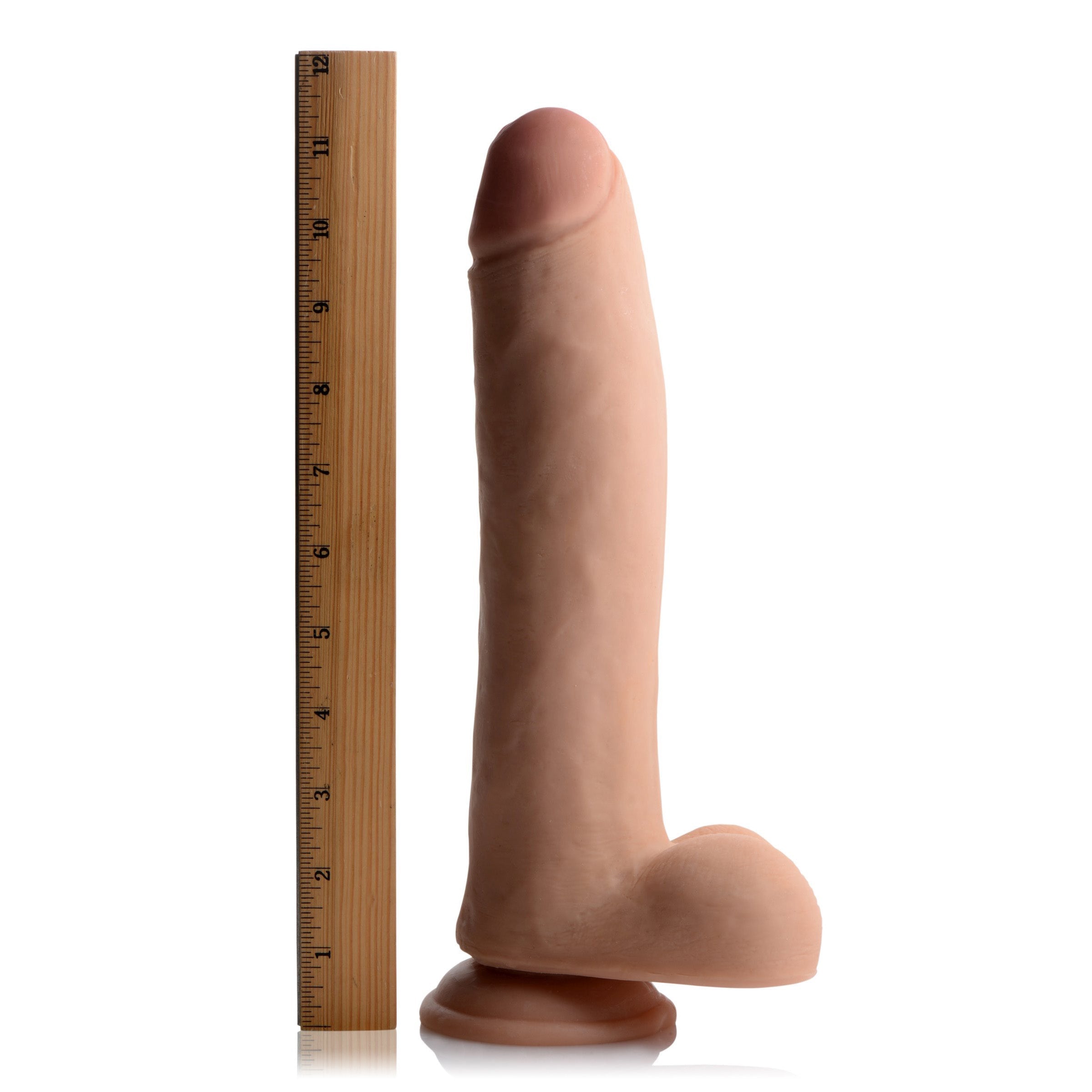 Nathan Skintech Realistic 11 Inch Dildo shown with a ruler for scale