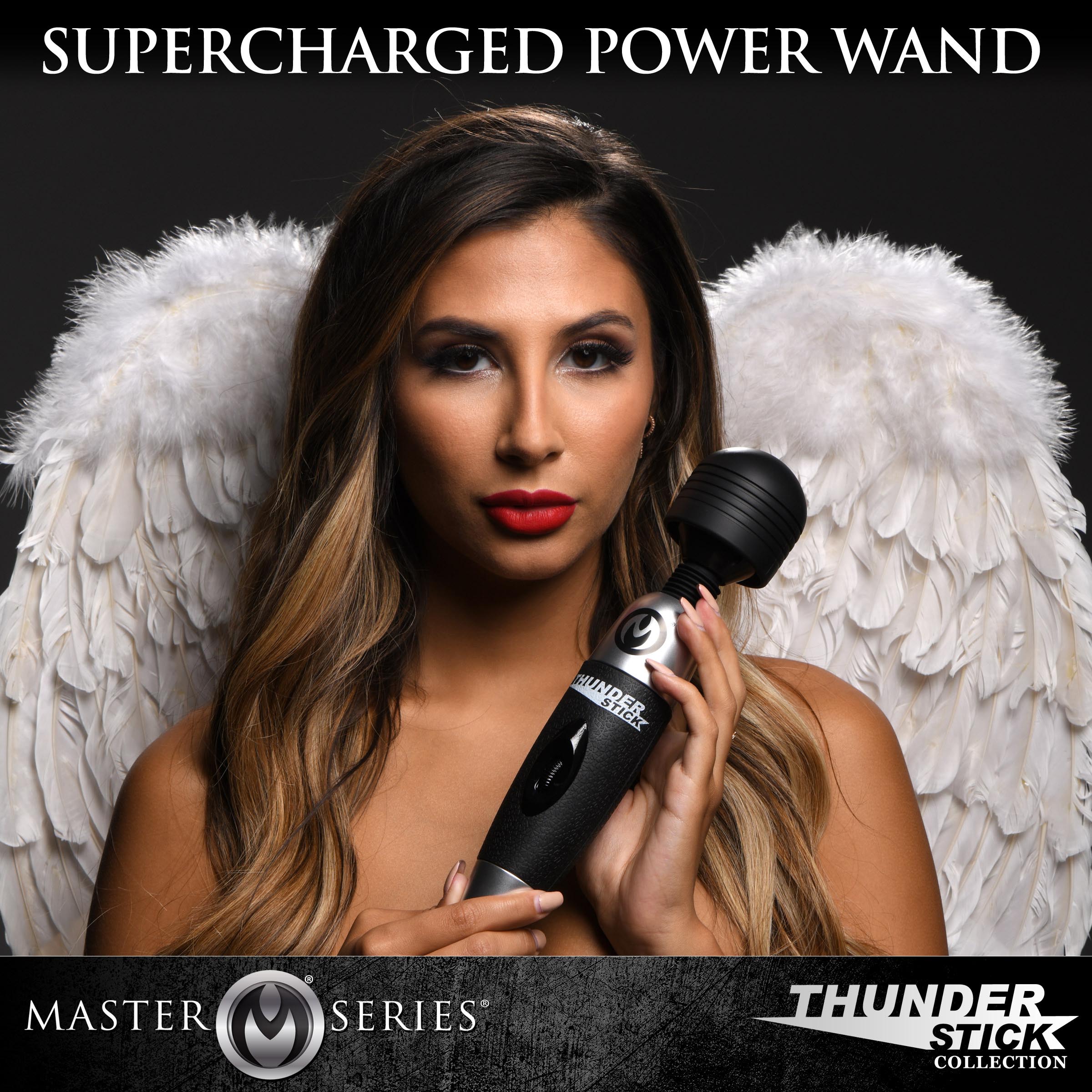 Black Thunderstick 2.0 held by a woman with stylized angel wings