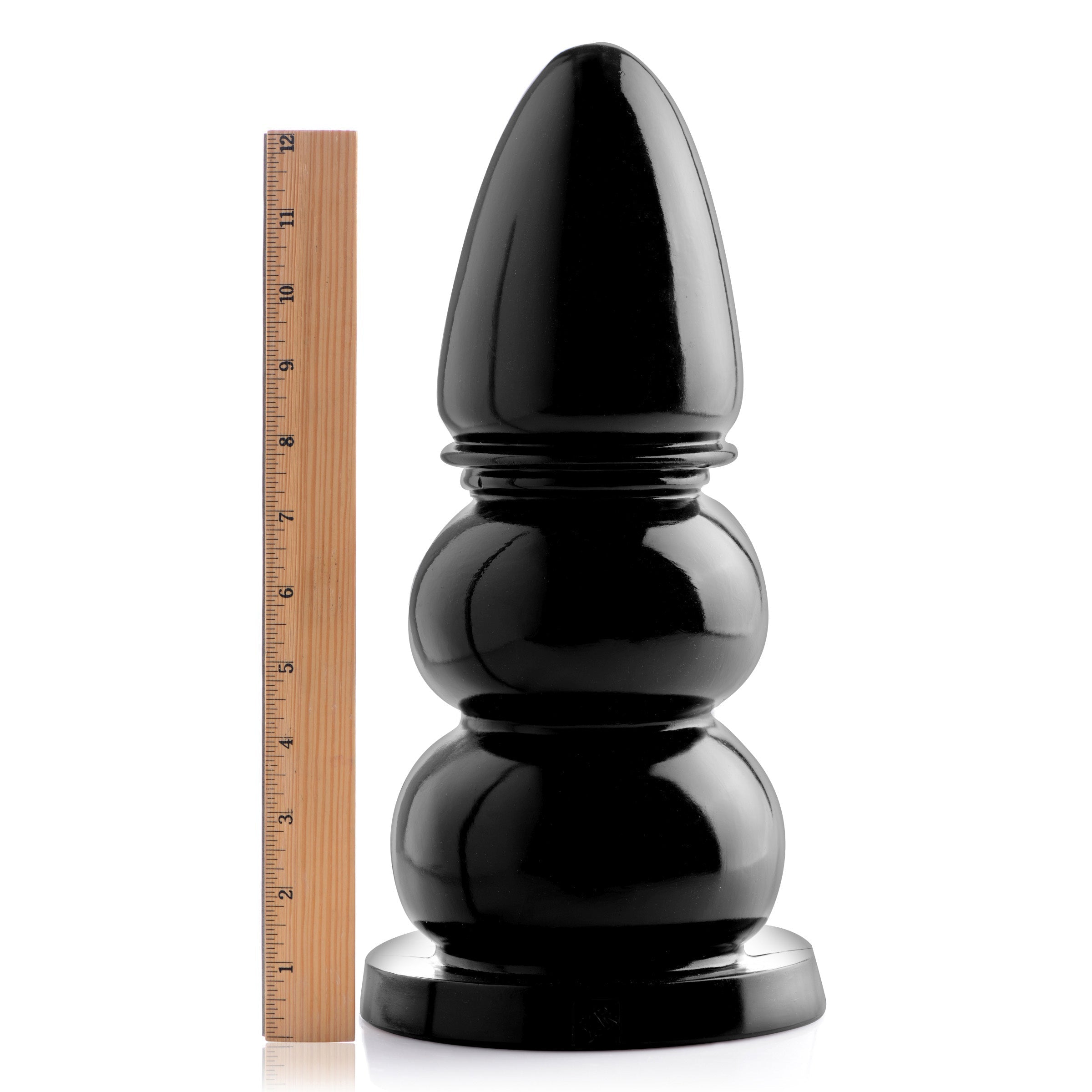 Wrecking Balls XXL Giant Dildo next to a measuring ruler for scale