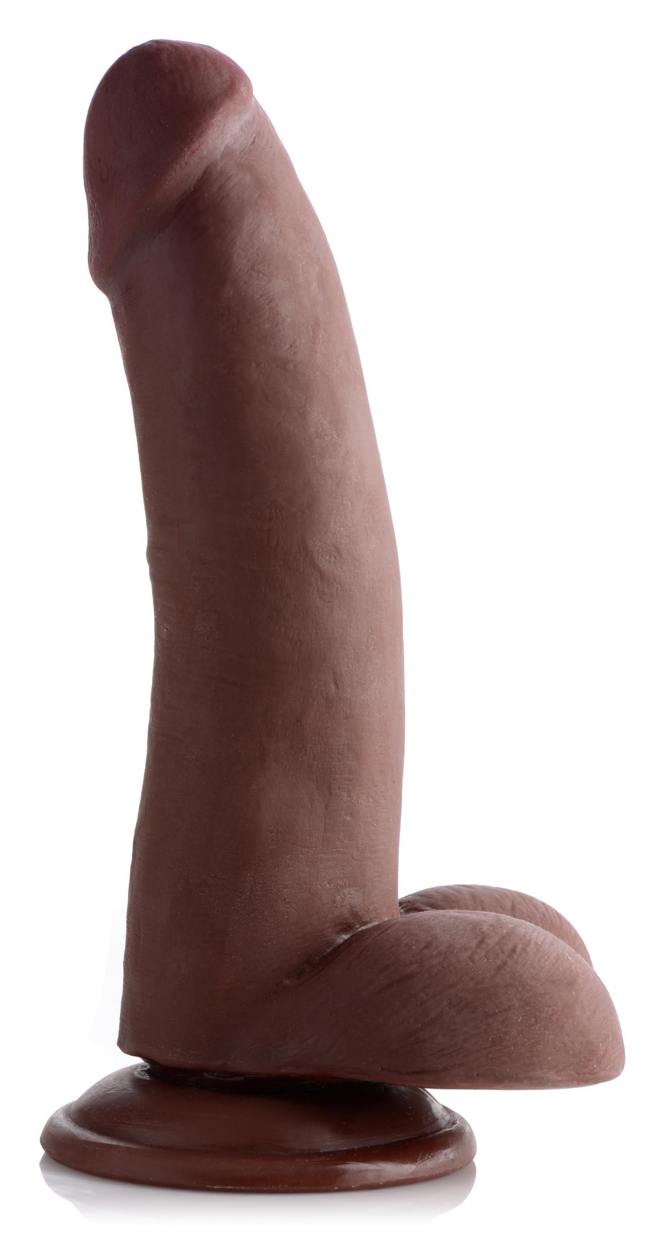 The realistic dildo in a chocolate color displayed on a wooden stand