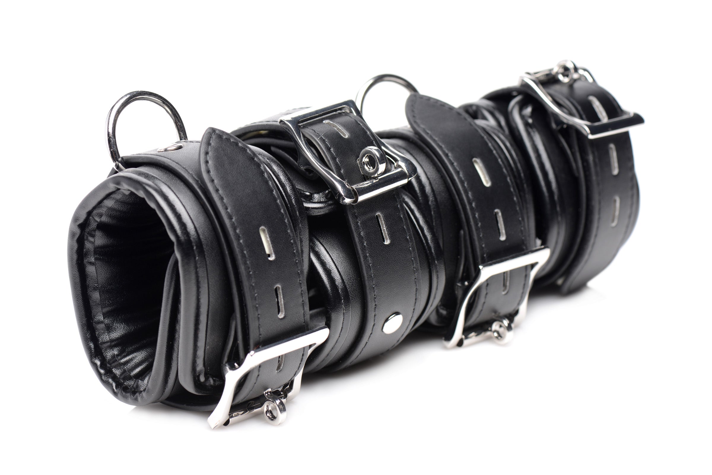 Detailed image of leather bondage cuffs featuring multiple straps