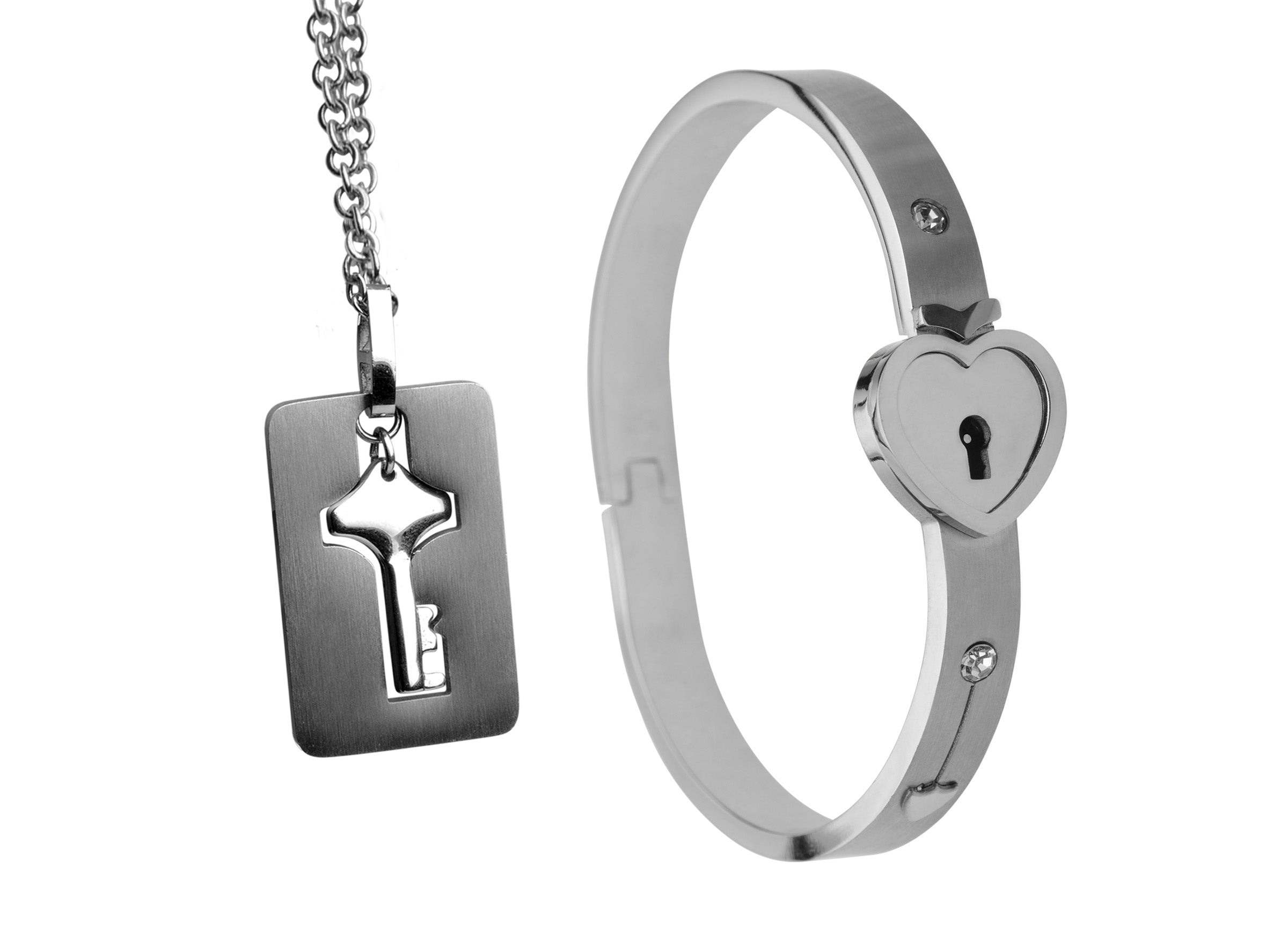 Silver cuff bracelet paired with a matching heart-shaped key pendant