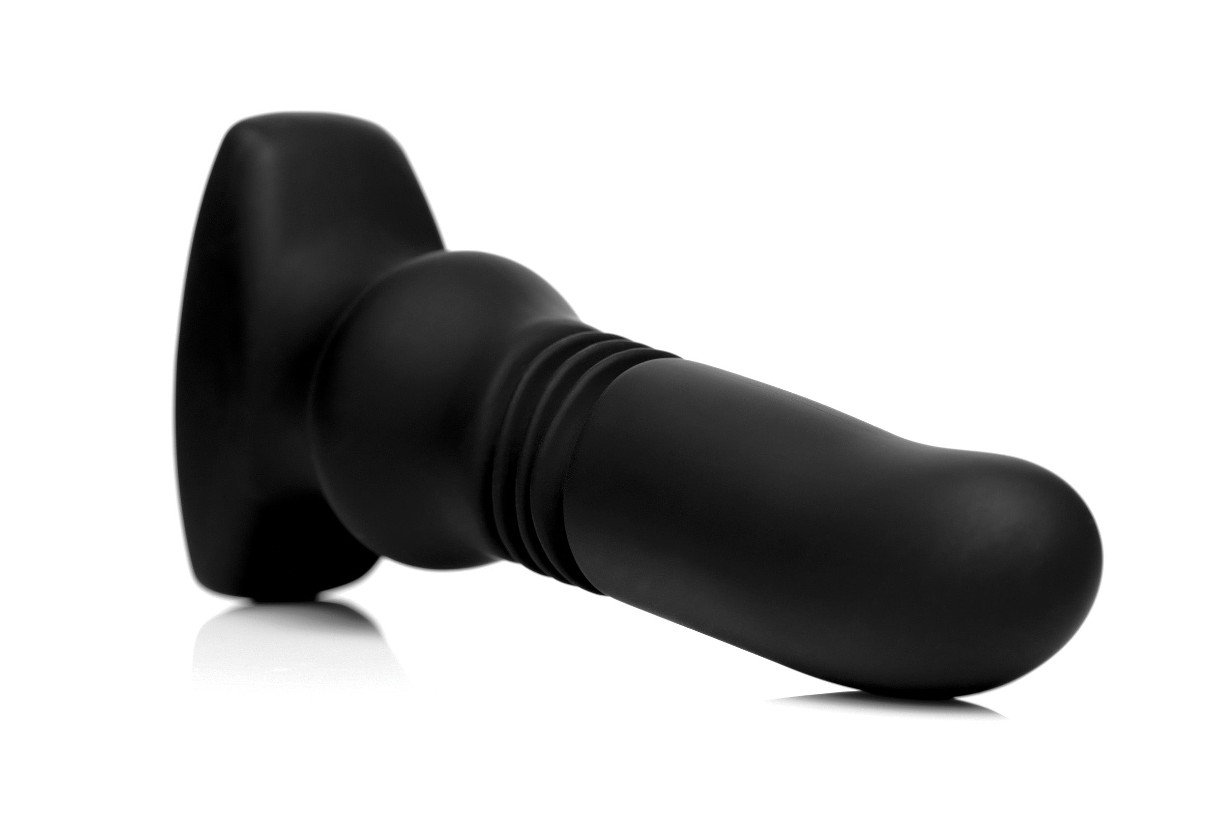 Silicone vibrating and thrusting plug displayed on a white background