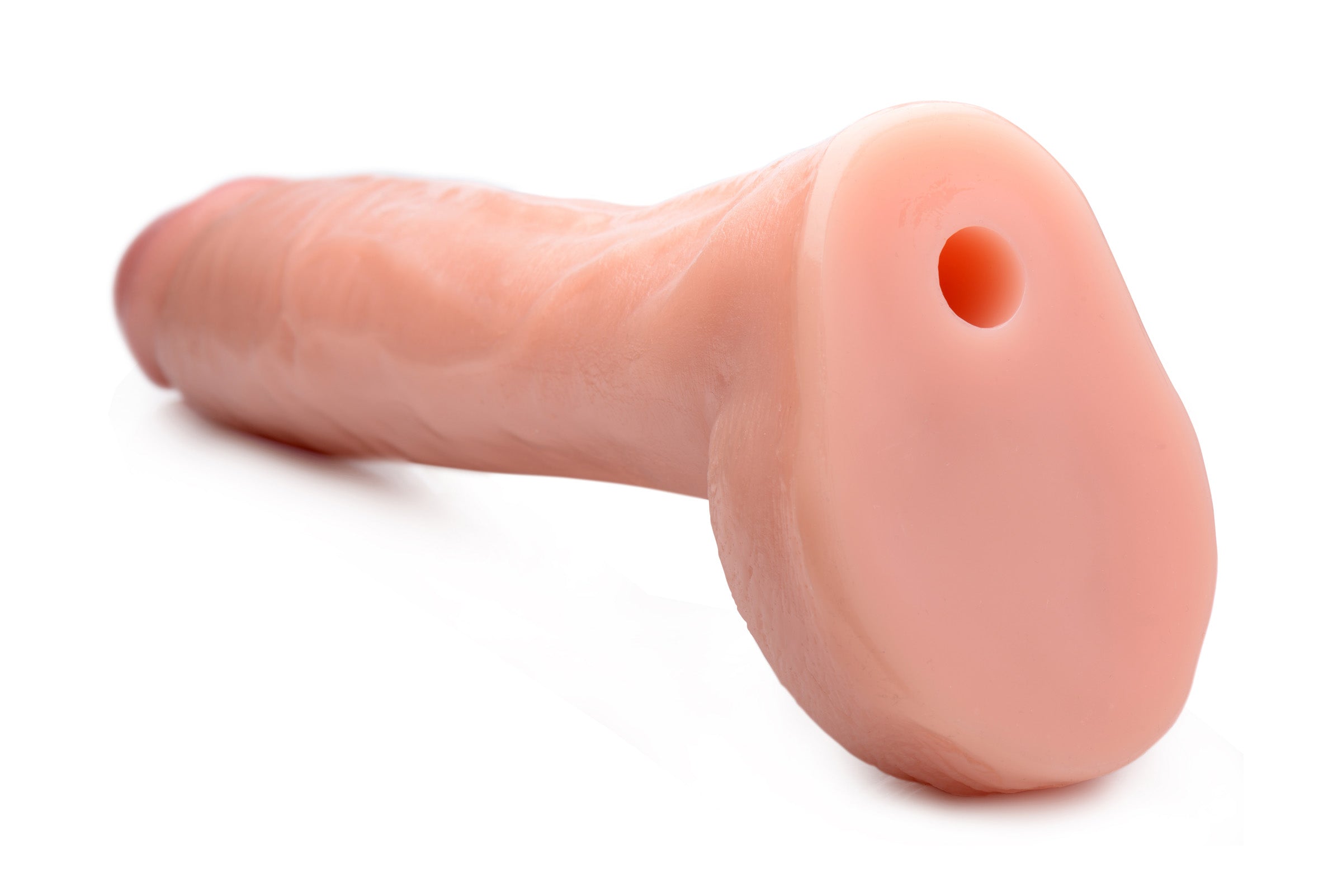 Close-up of a 10-inch pink dildo with realistic texture on a white backdrop