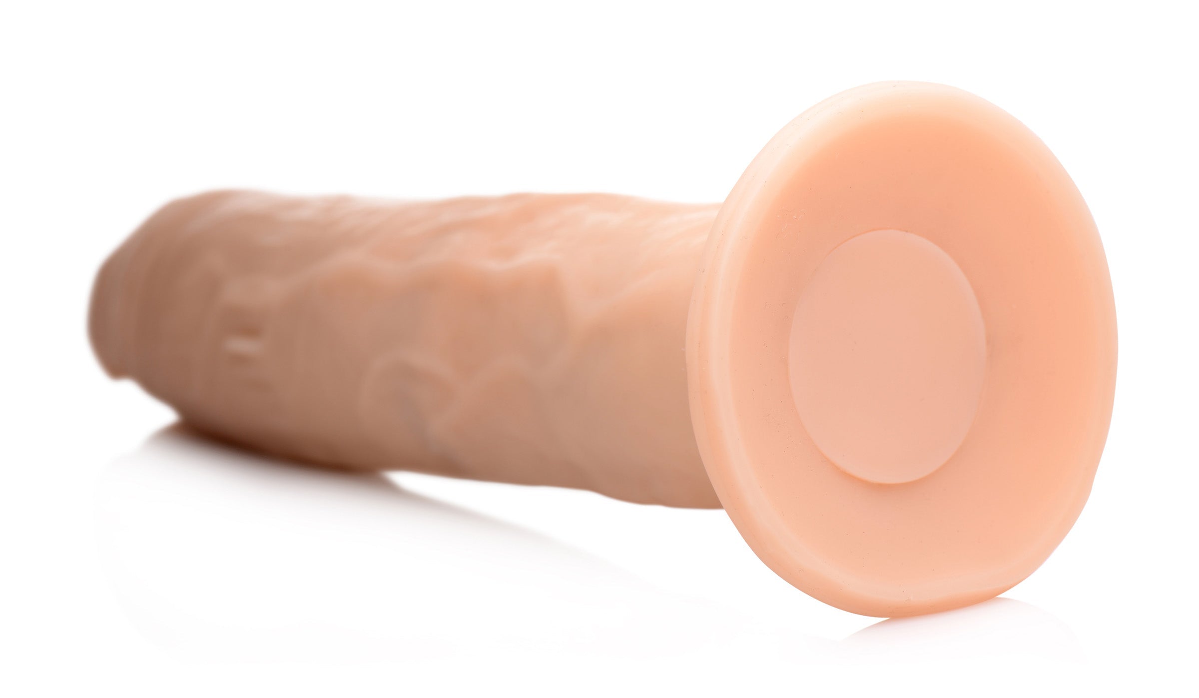 Detailed view of the Kinetic Thumping 7x Dildo's textured surface