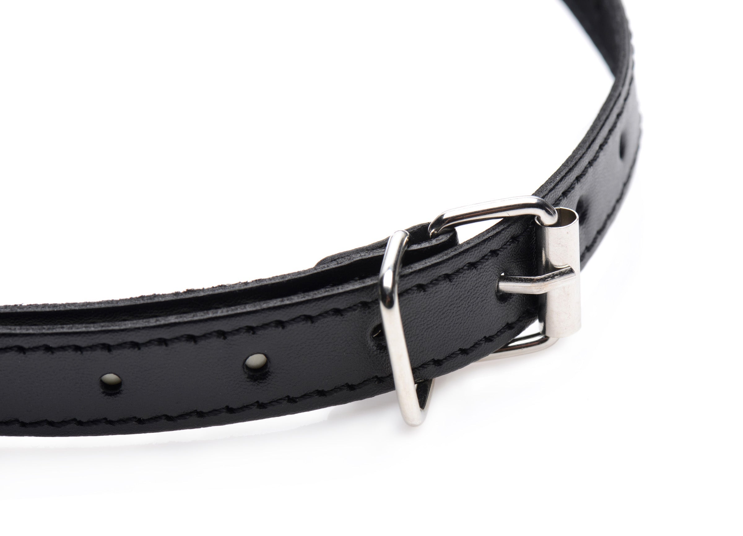 Close-up of the gag set's metal buckle on black leather