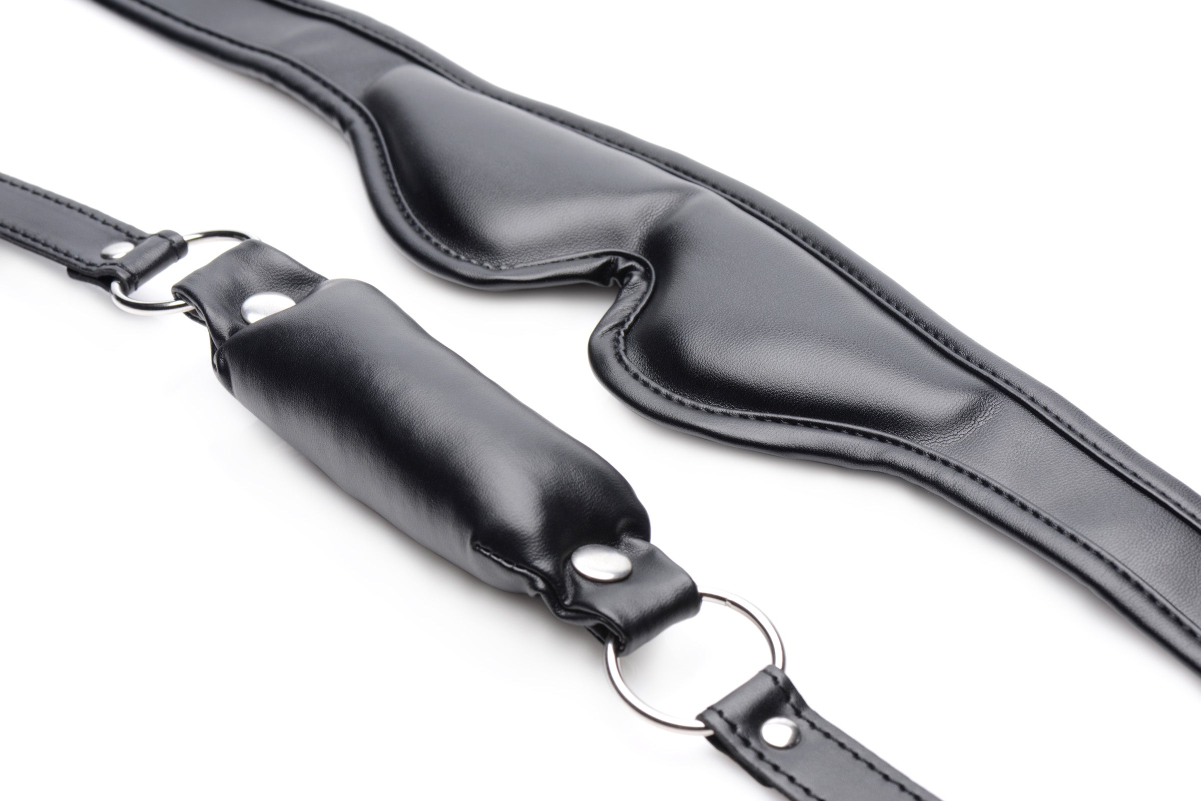 Adjustable black leather straps with metal buckles from the set