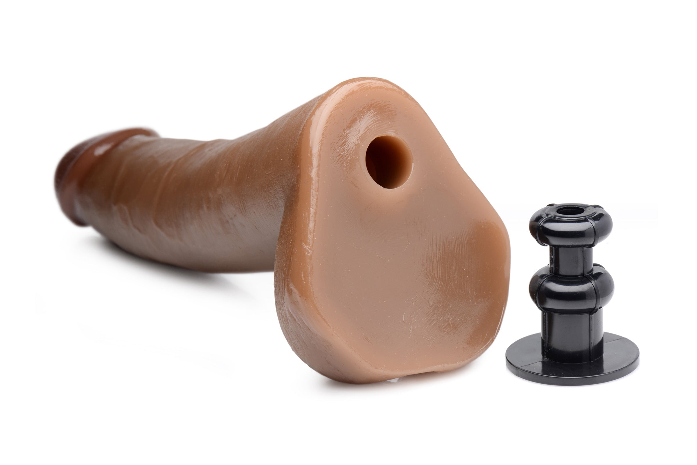 Close-up of the brown and black Cock Lock dildo with plug