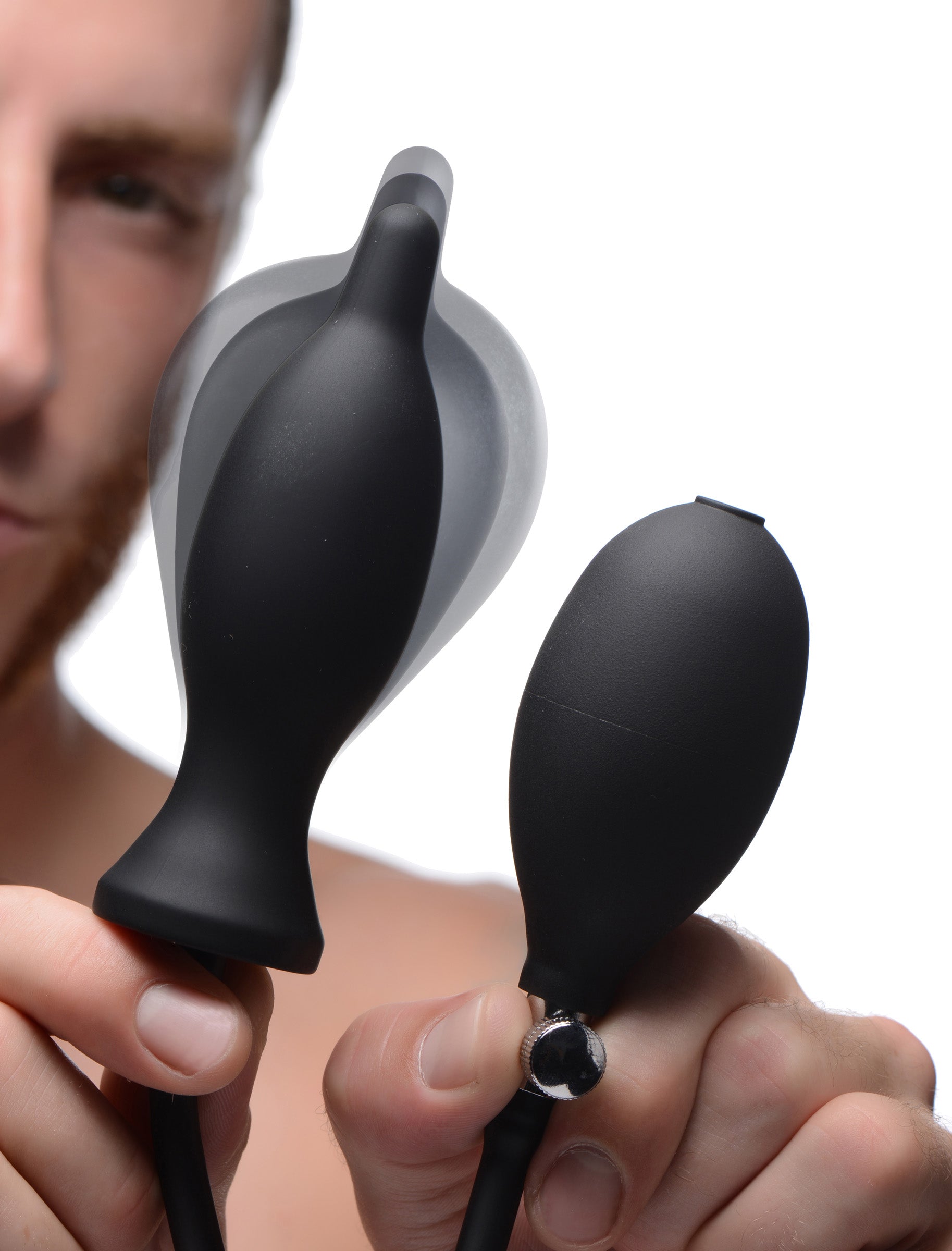 Close-up of the Dark Inflator Silicone Inflatable Anal Plug with a hand for scale