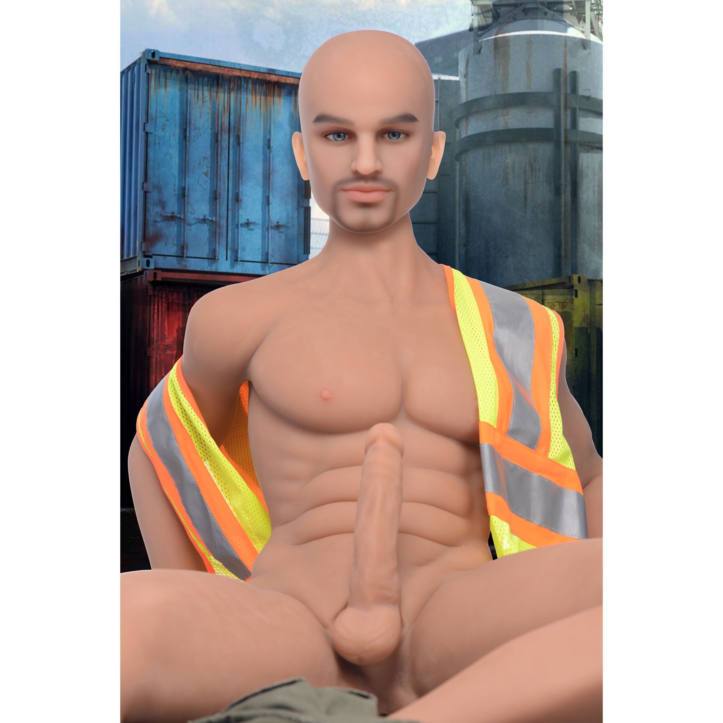 Tyler male doll seated on a bench in a construction outfit