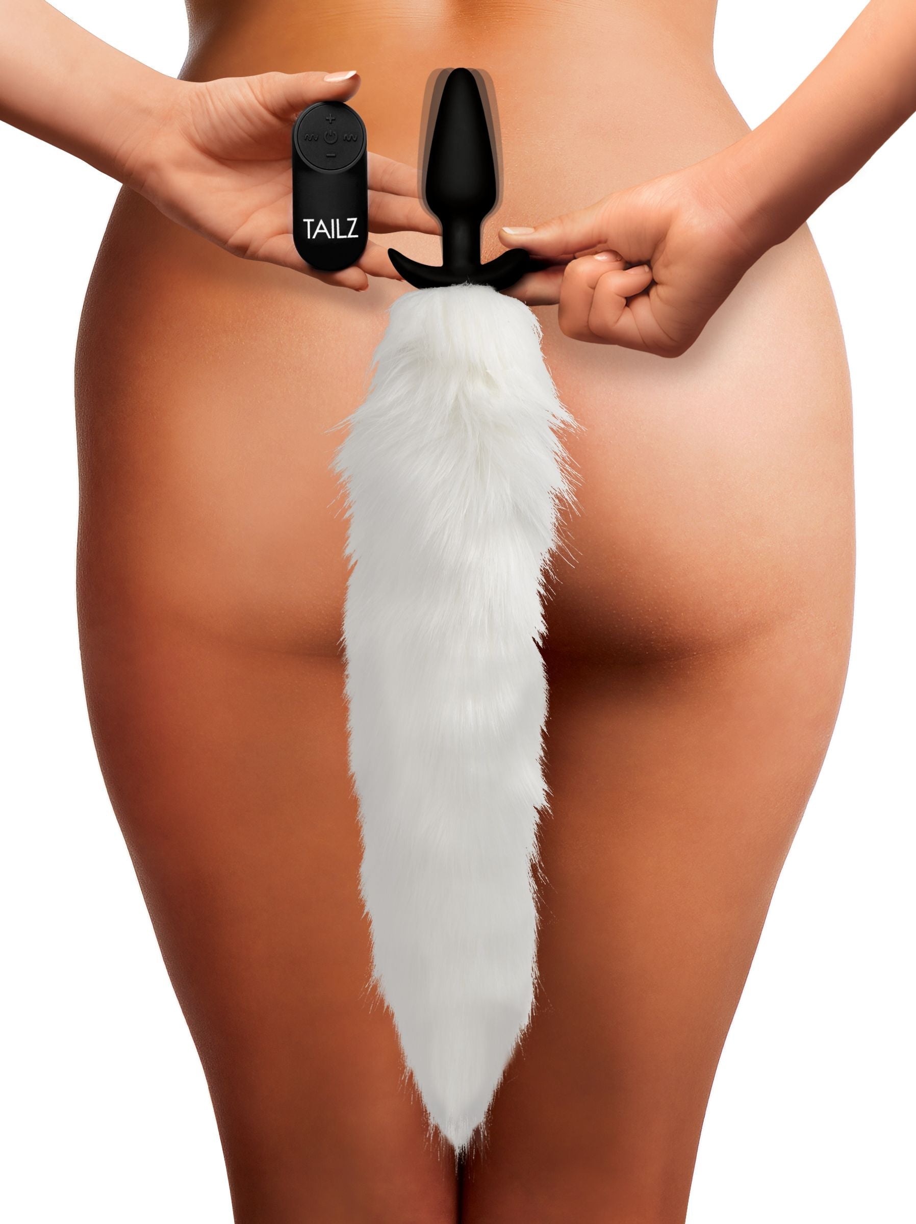 Rear view of a model wearing the white fox tail slender anal plug