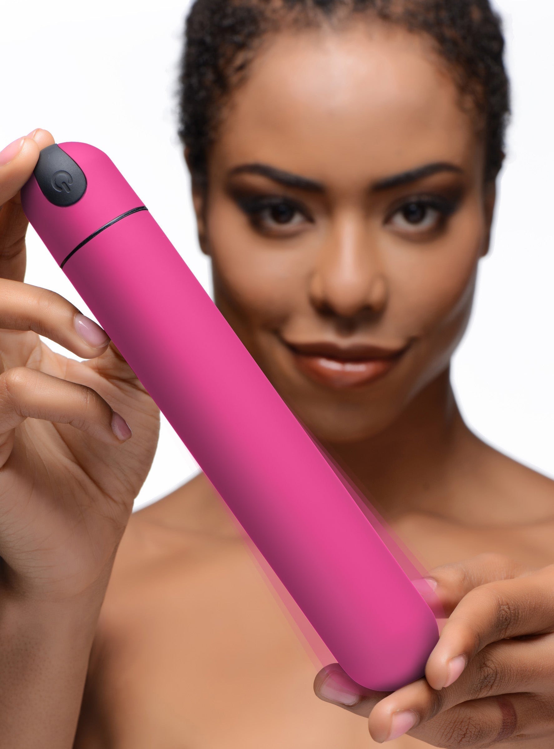 Pink XL Bullet Vibrator being held by a woman