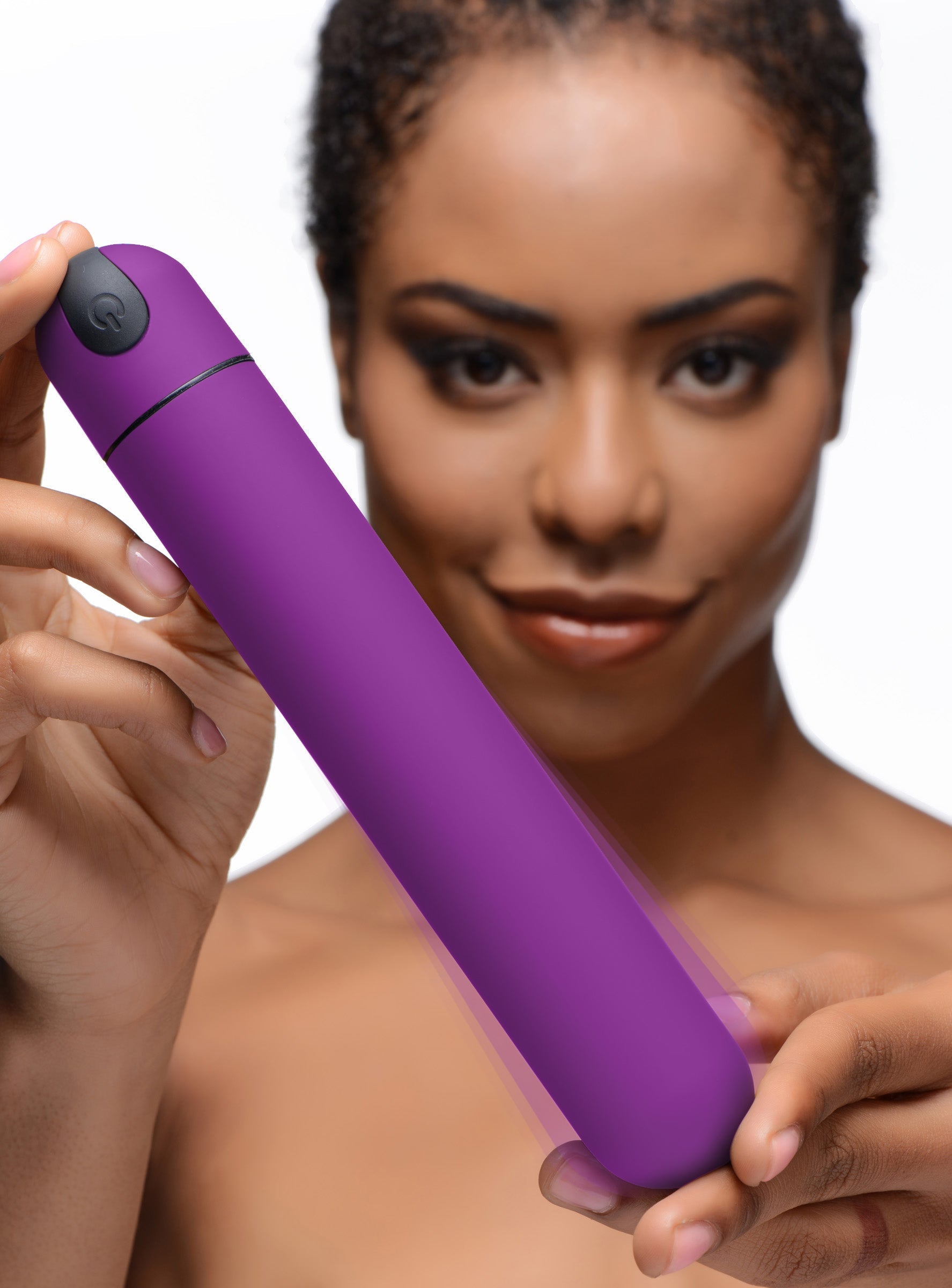 Hand presenting the XL Bullet Vibrator in purple