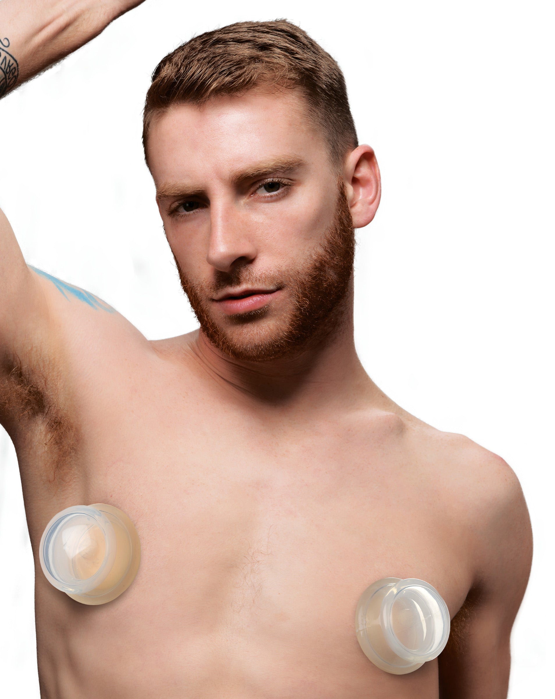 Close-up of clear silicone nipple suckers designed for body enhancement