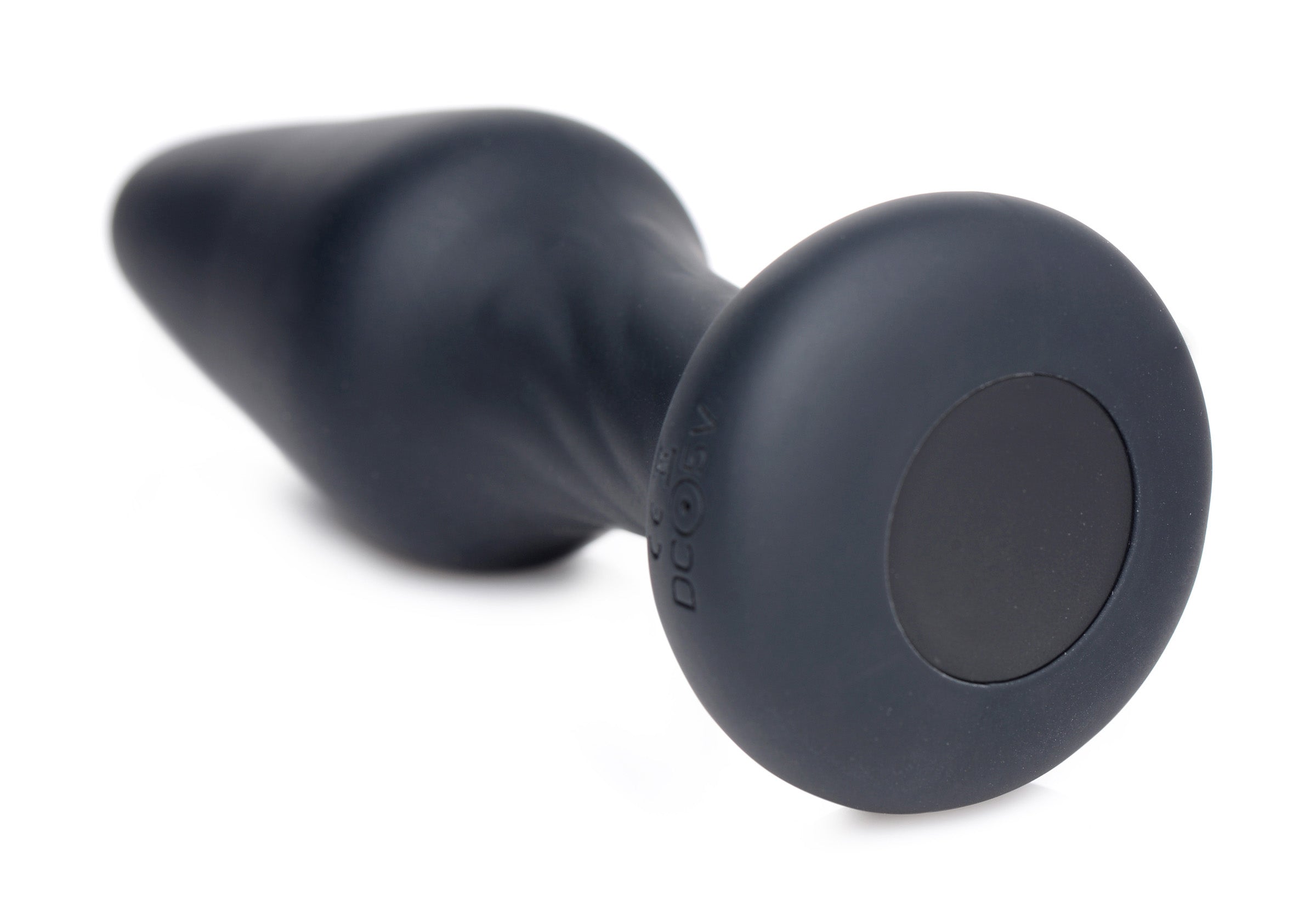 Close-up of the black silicone anal plug with power button