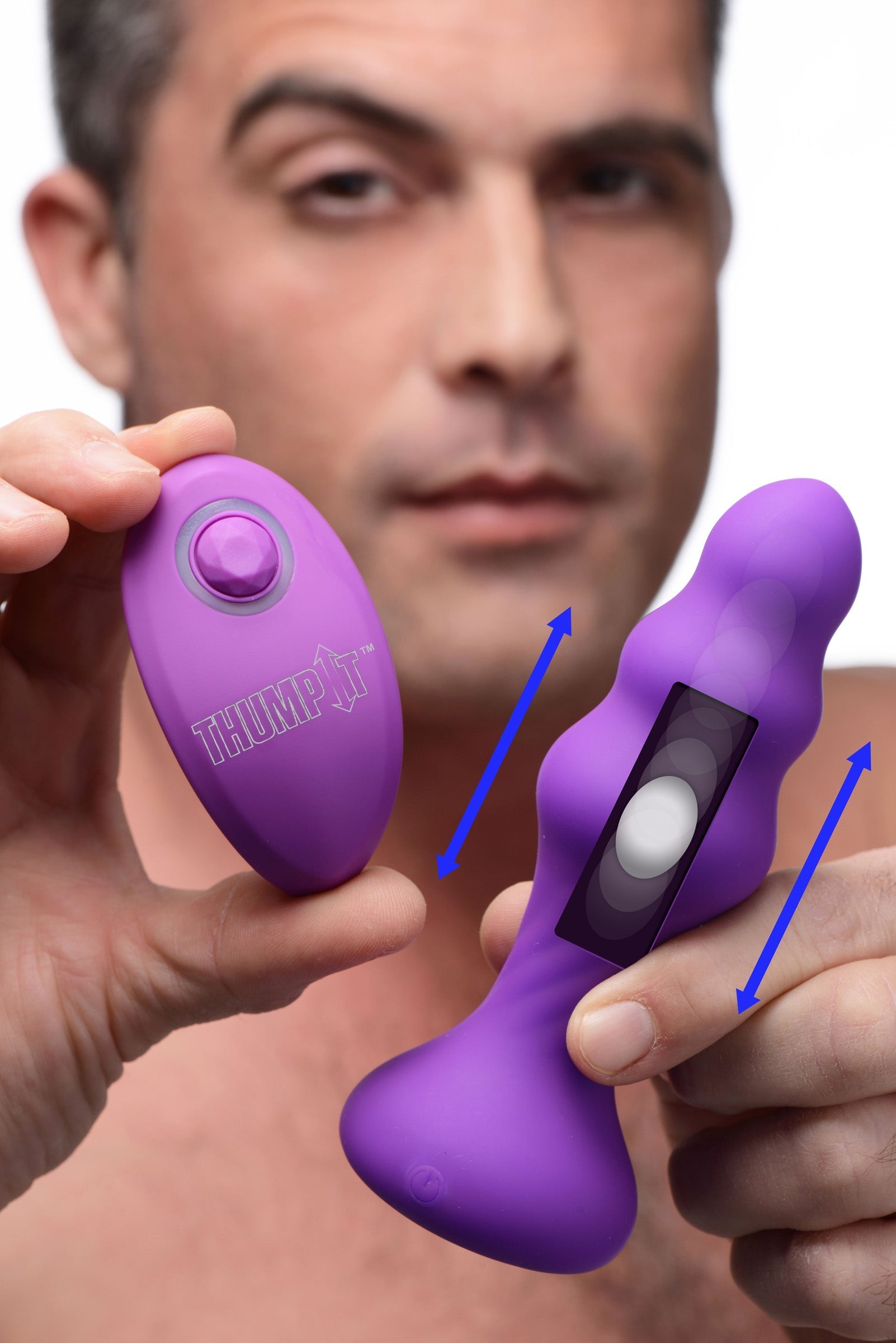 Close-up of a person holding the 7x Slim Ribbed Thumping Silicone Anal Plug