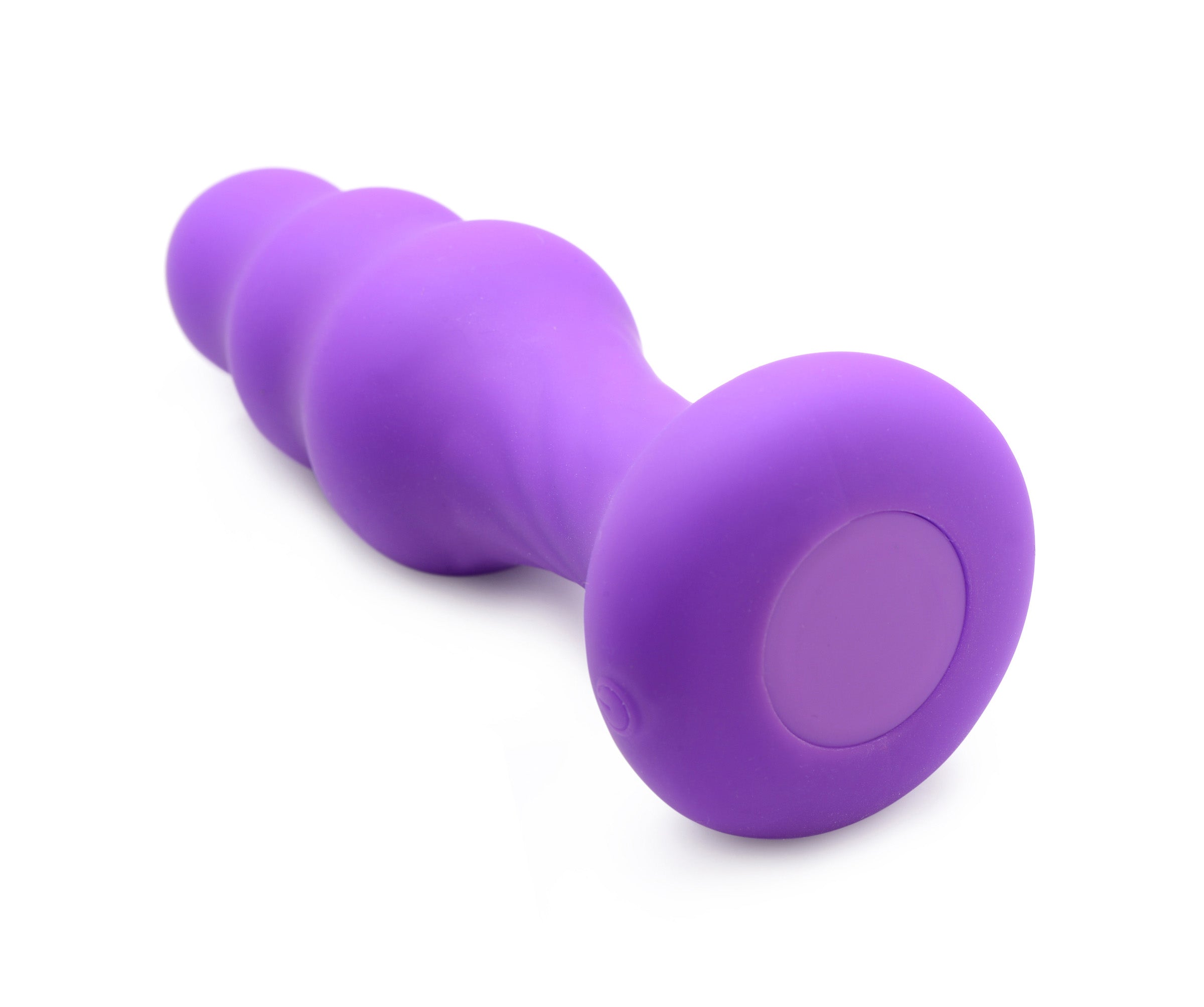 The 7x Slim Ribbed Thumping Silicone Anal Plug isolated on a white surface