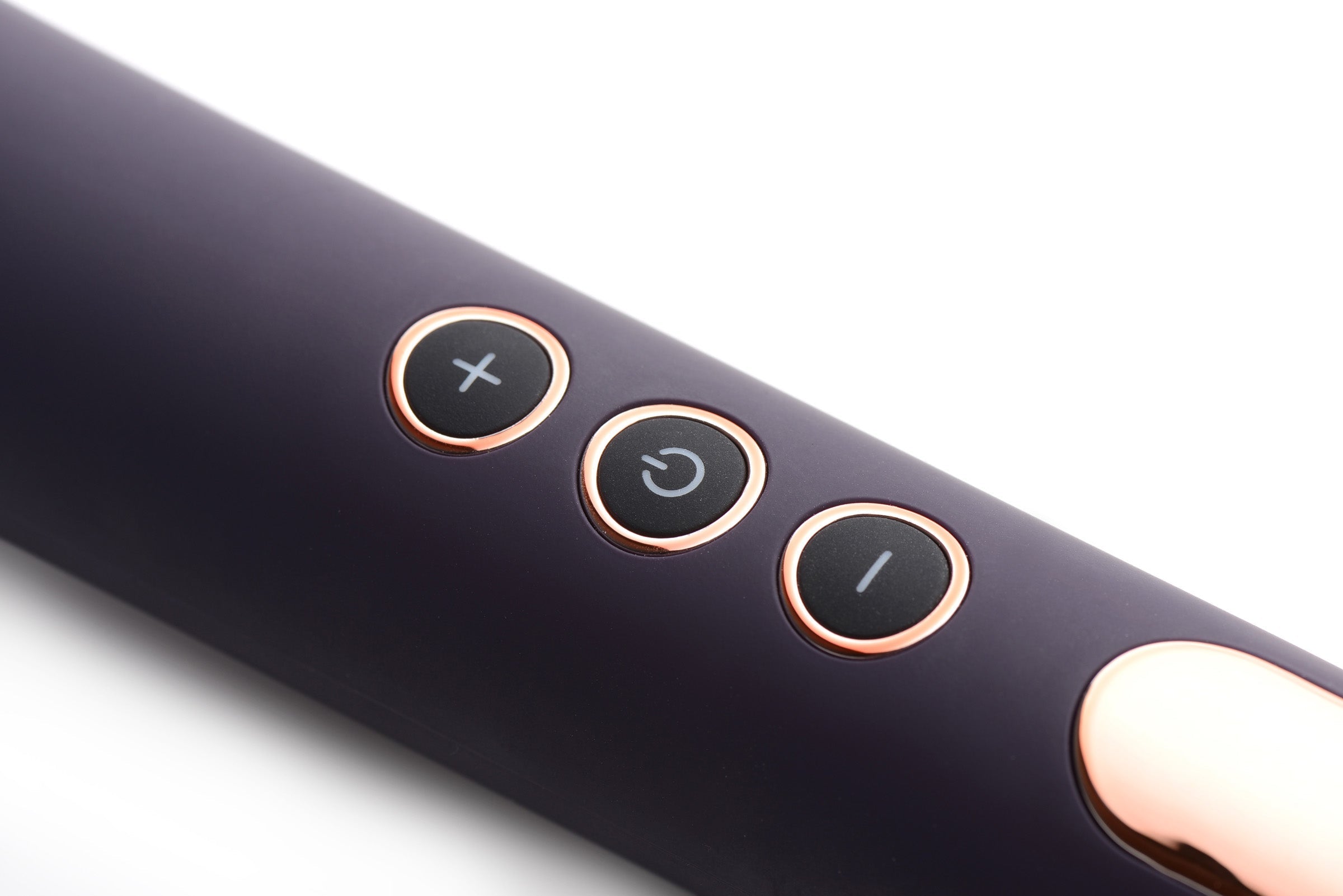 Close-up view of the Scepter 50x Silicone Wand Massager's control buttons