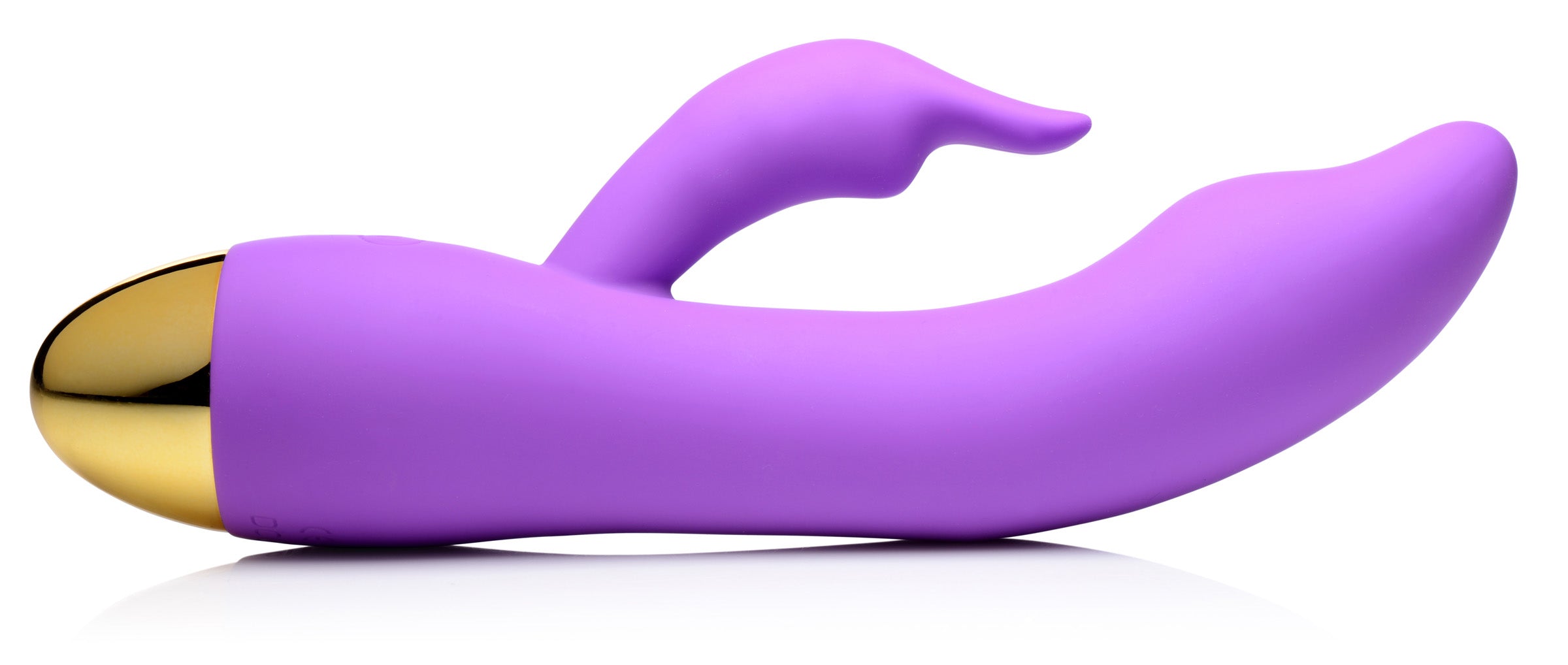 Purple silicone vibrator featuring a gold accent at the tip