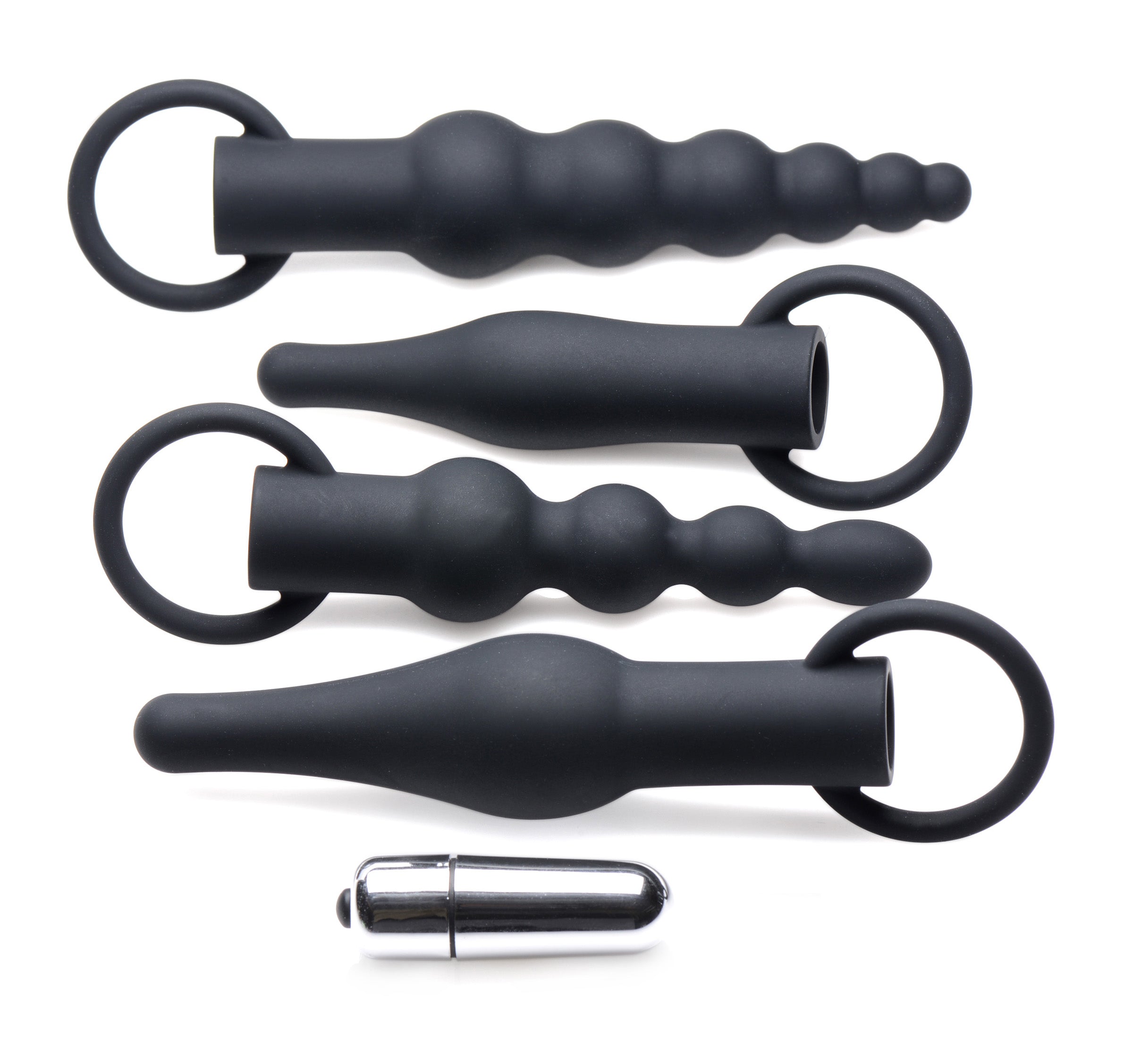 Close-up view of a black silicone anal training set with varying sizes