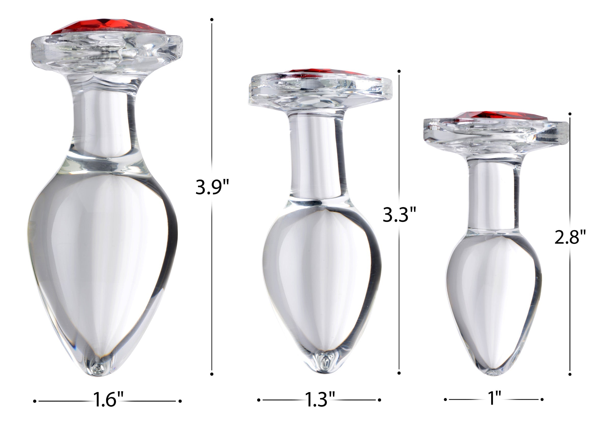 Collection of three anal plugs with red heart-shaped glass design