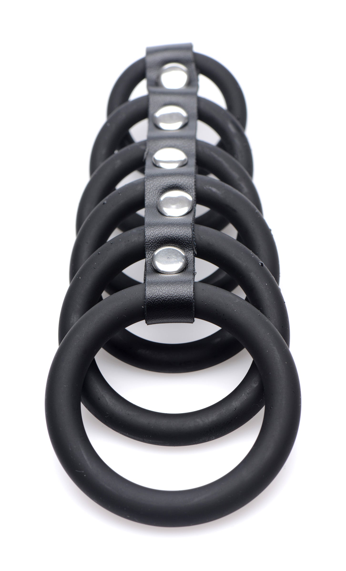 Multiple black silicone rings designed for chastity device