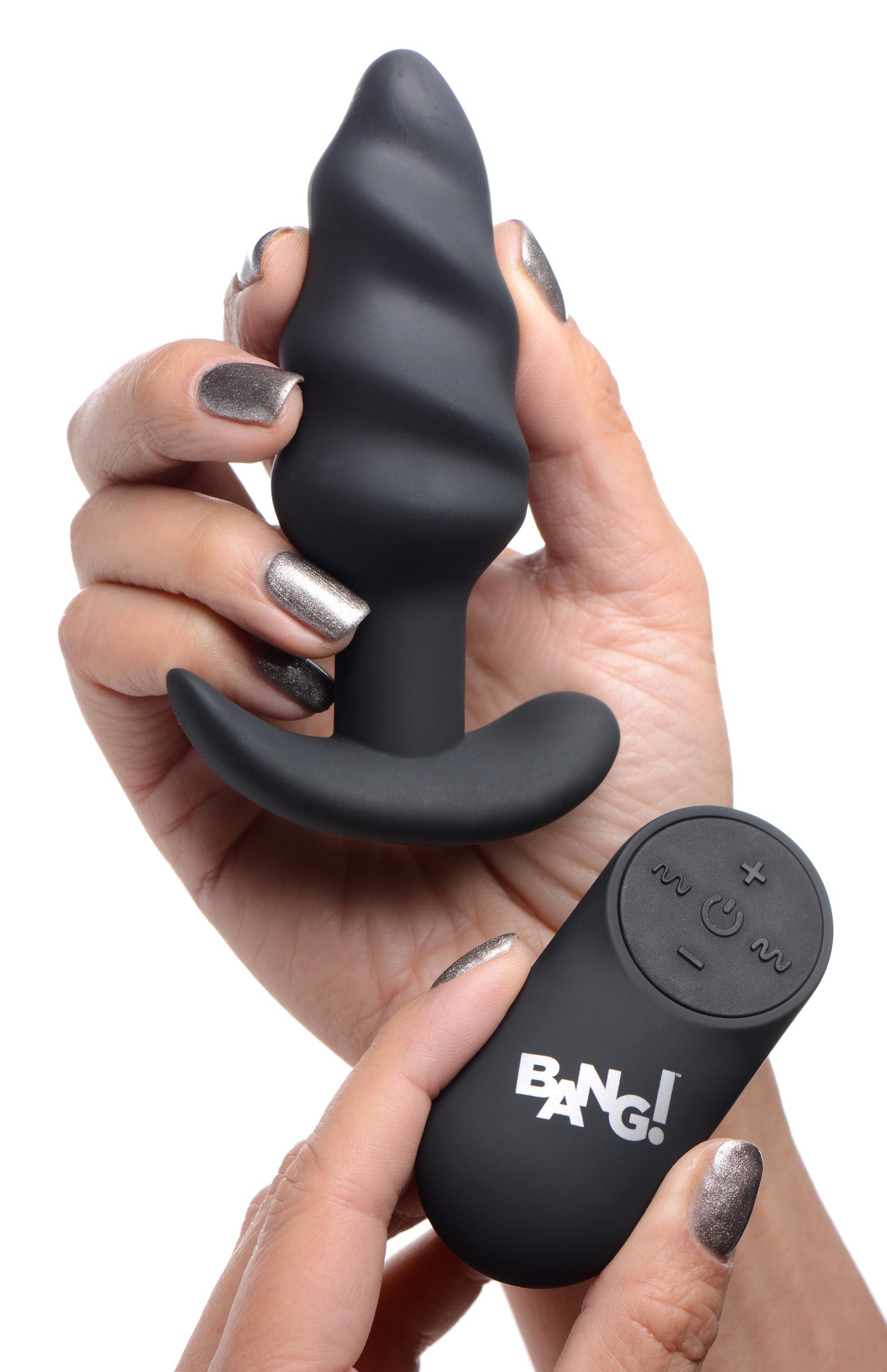 Close-up of a hand holding the remote control for the 21x vibrating butt plug