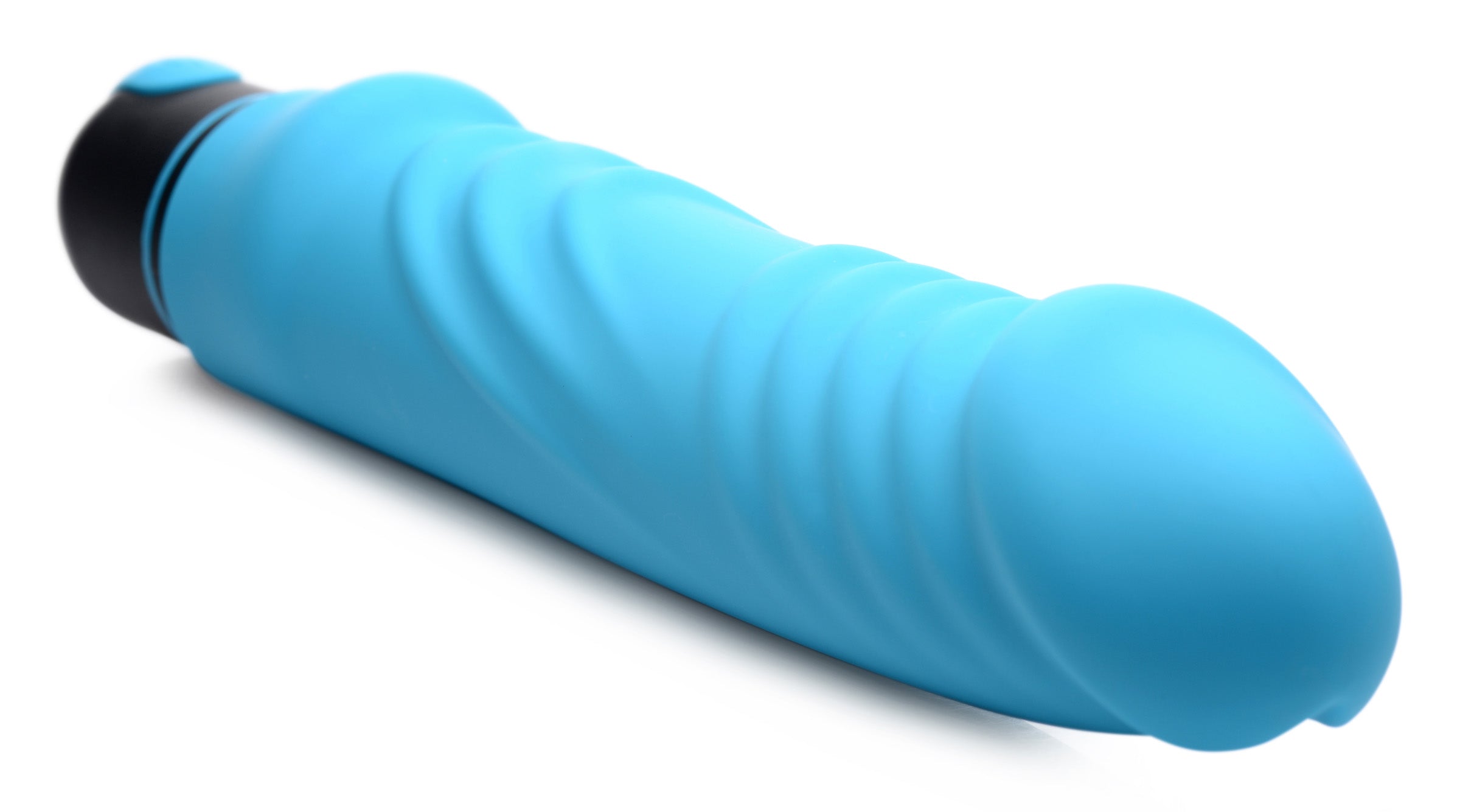 Blue ribbed sleeve for the XL Silicone Bullet resting on a white surface