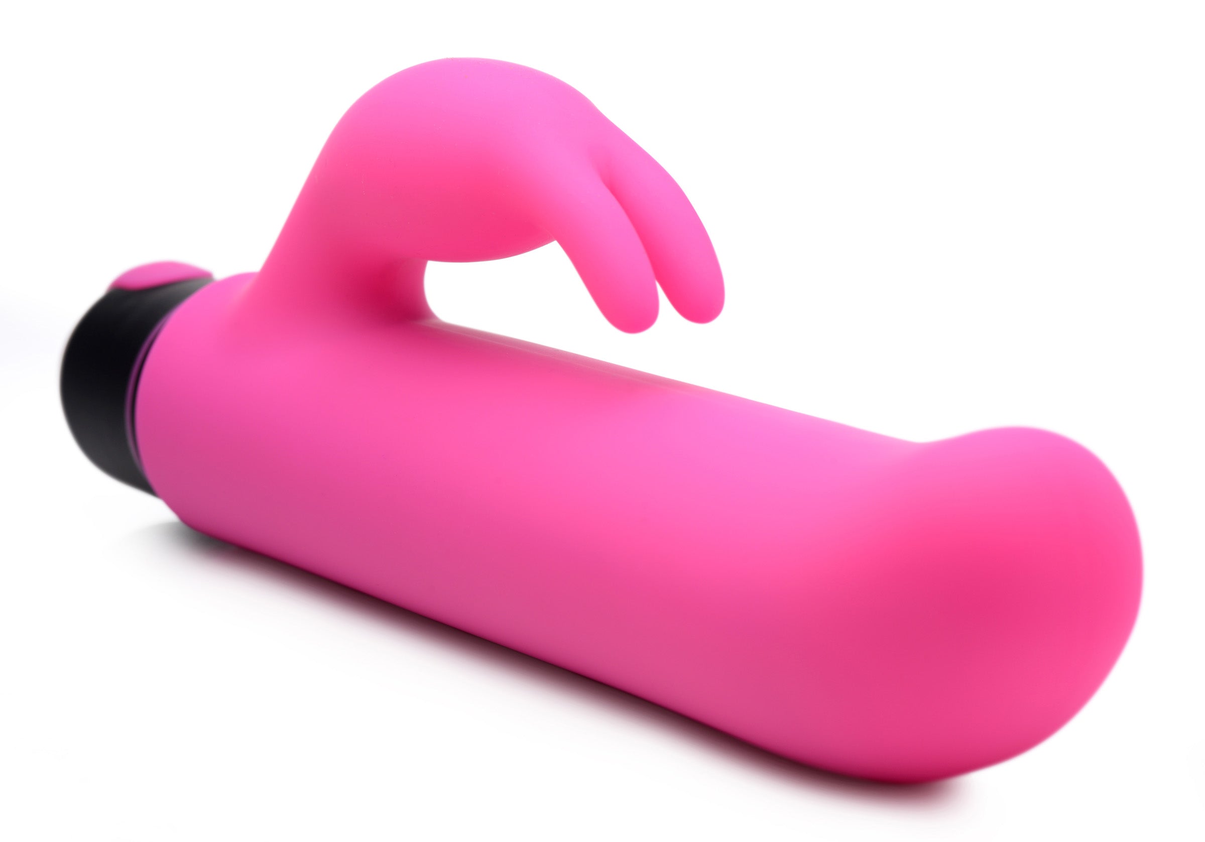 Hand holding the pink rabbit sleeve accessory for the XL bullet vibrator