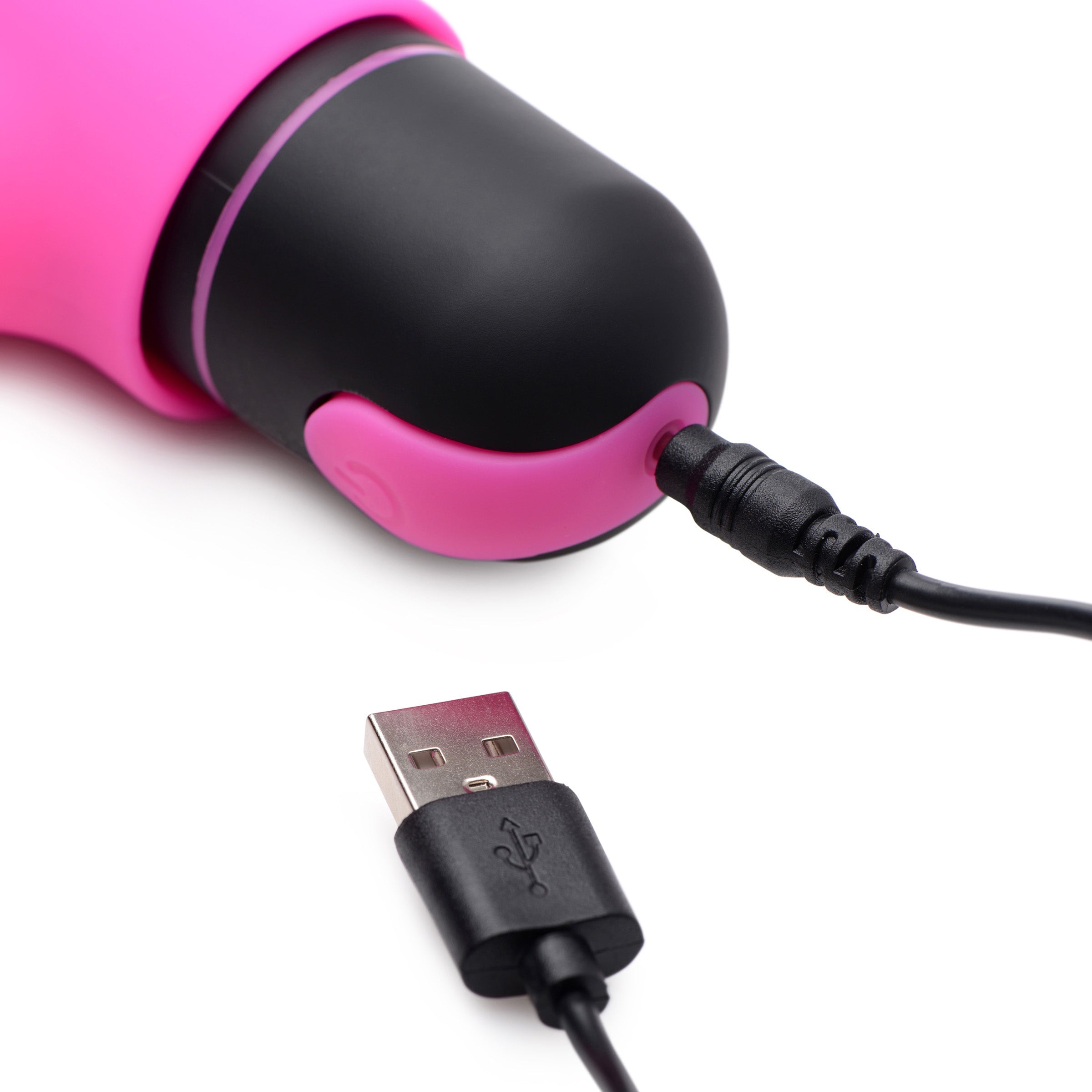 Pink and black USB charging cable connected to the XL bullet vibrator with rabbit sleeve