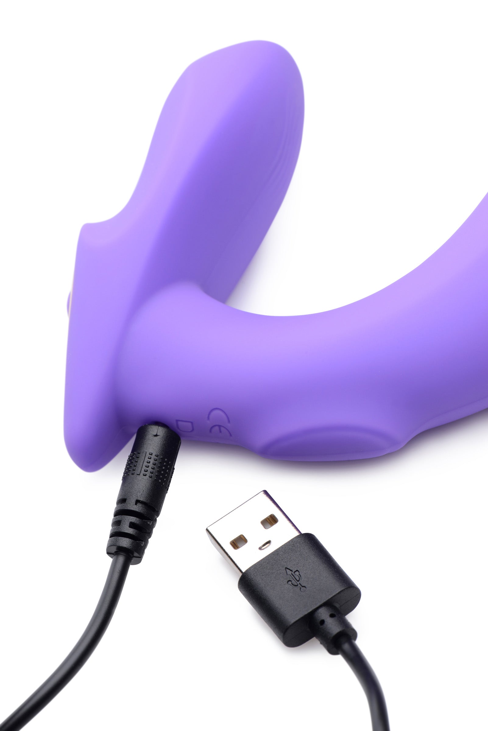 The 10x G-tap Silicone G-spot Vibrator connected to a USB charging cable