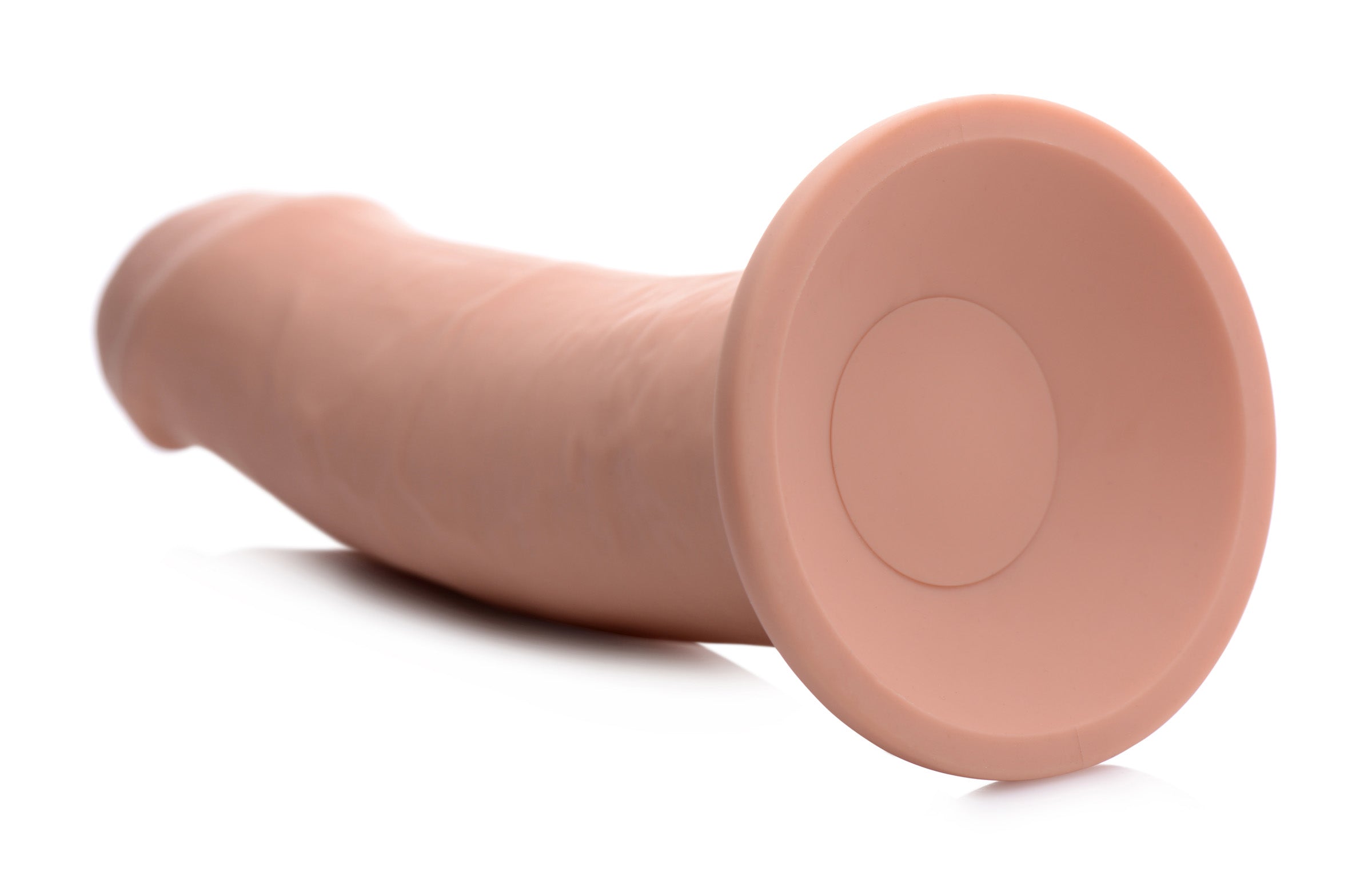 Pink inflatable and vibrating silicone dildo isolated on white